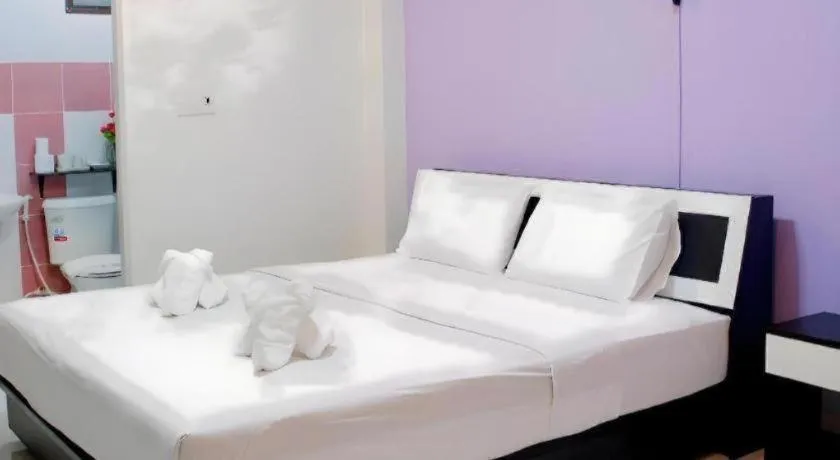 Bed in Nan Treasure Hotel