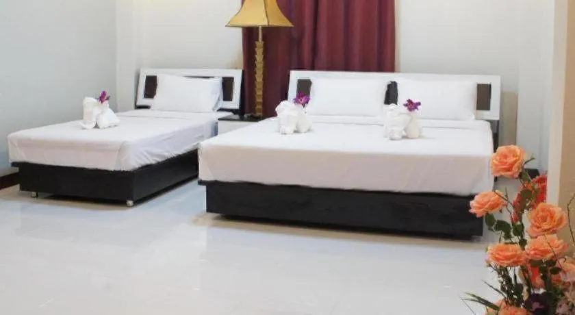 Bed in Nan Treasure Hotel