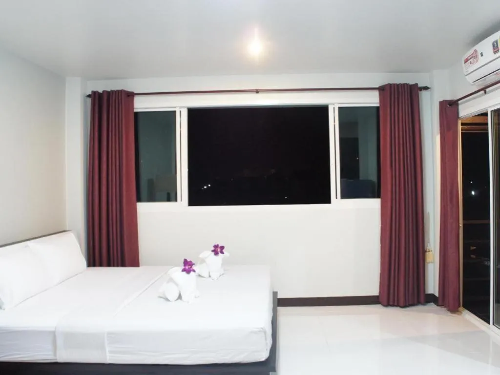 Bed in Nan Treasure Hotel