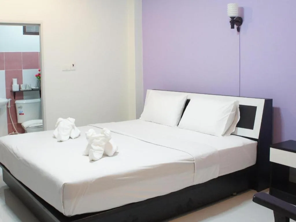 Bed in Nan Treasure Hotel