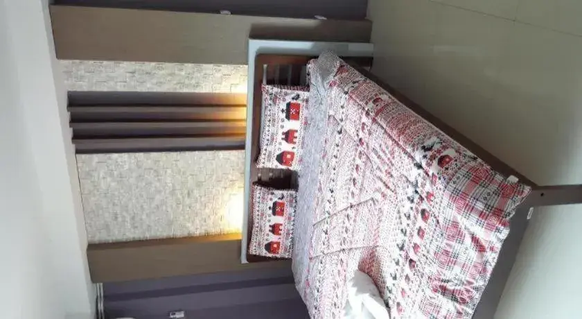 Bed in RungRoj Panich Hotel Bed in RungRoj Panich Hotel