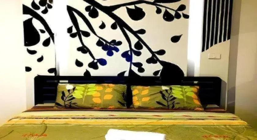 Bed in RungRoj Panich Hotel Bed in RungRoj Panich Hotel