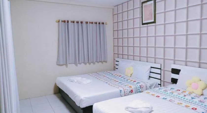 Bed in Nornnan Hotel