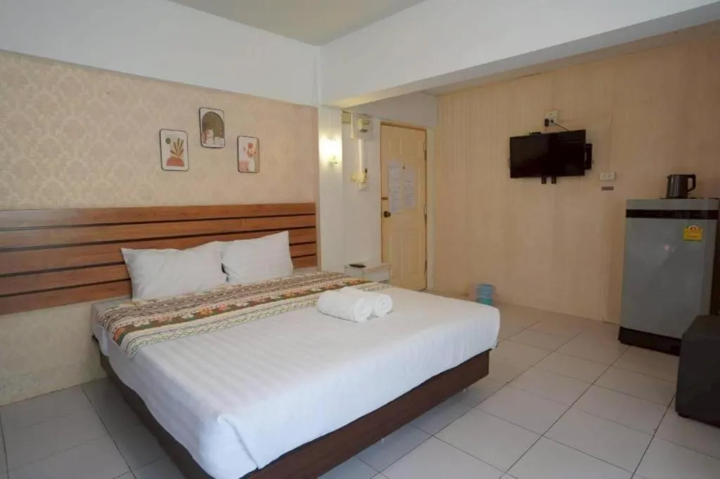 Bed in Nornnan Hotel