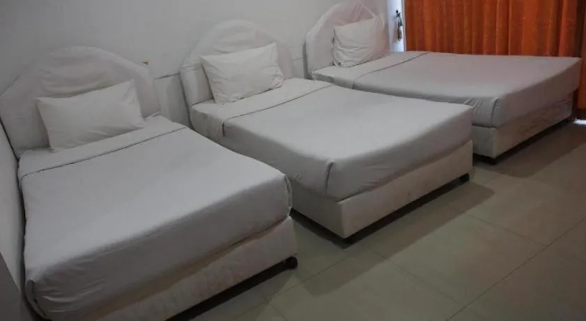 Bed in Phetsuwan Hotel