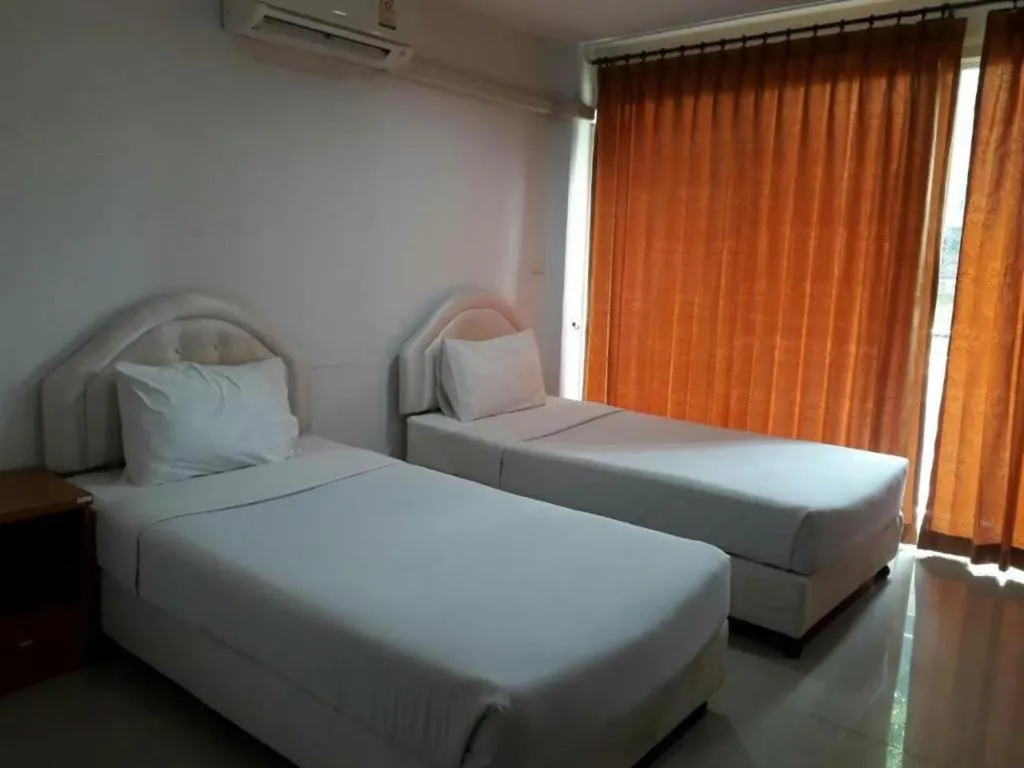 Bed in Phetsuwan Hotel