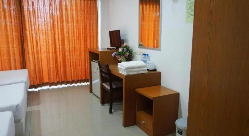 Bed in Phetsuwan Hotel