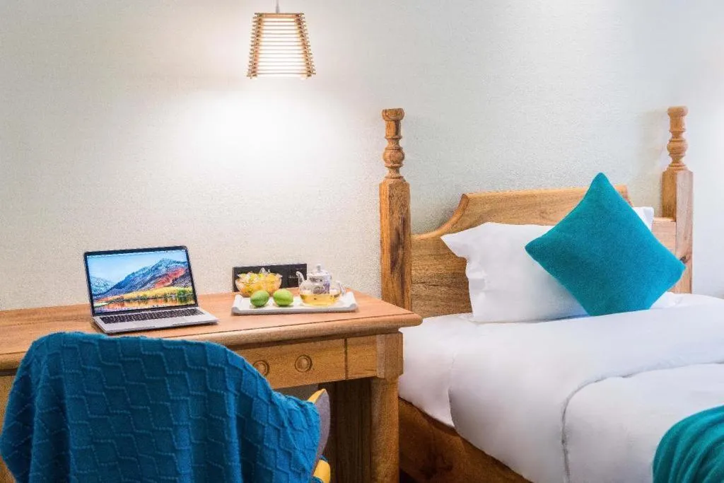 Bed in LARNG YAY  Riverview Resort Hotel