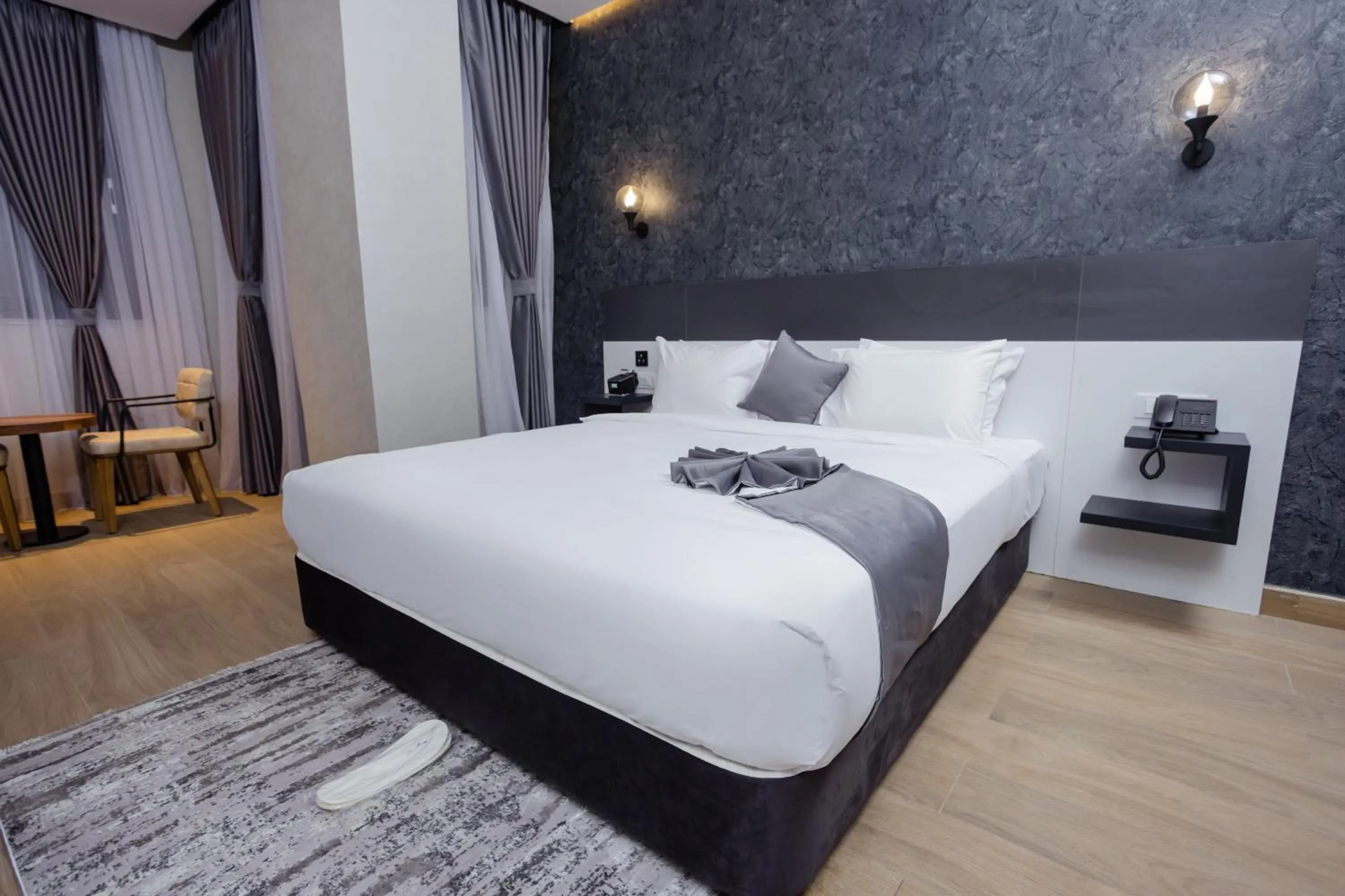 Bed in Shitaye Suite Hotel