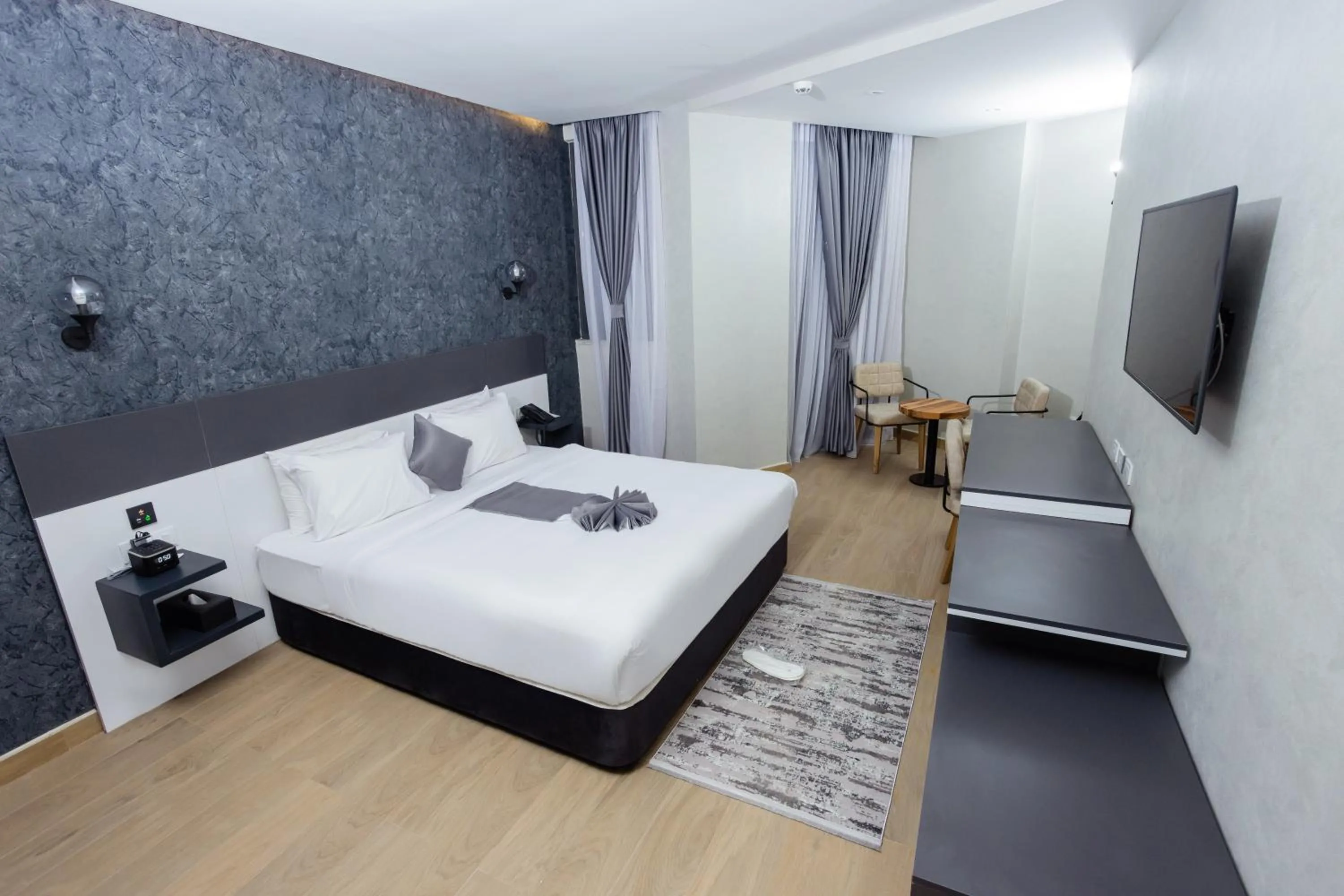 Bed in Shitaye Suite Hotel
