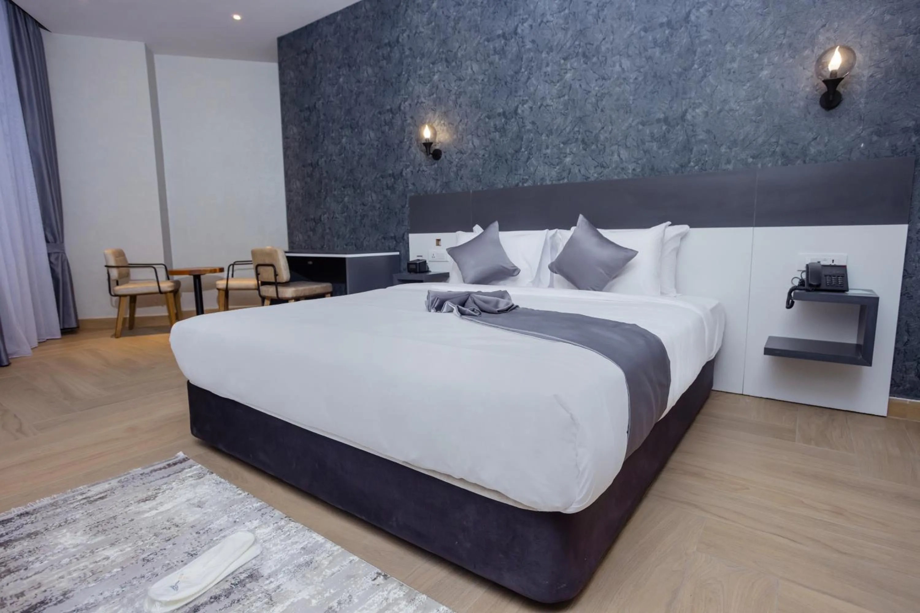 Bed in Shitaye Suite Hotel