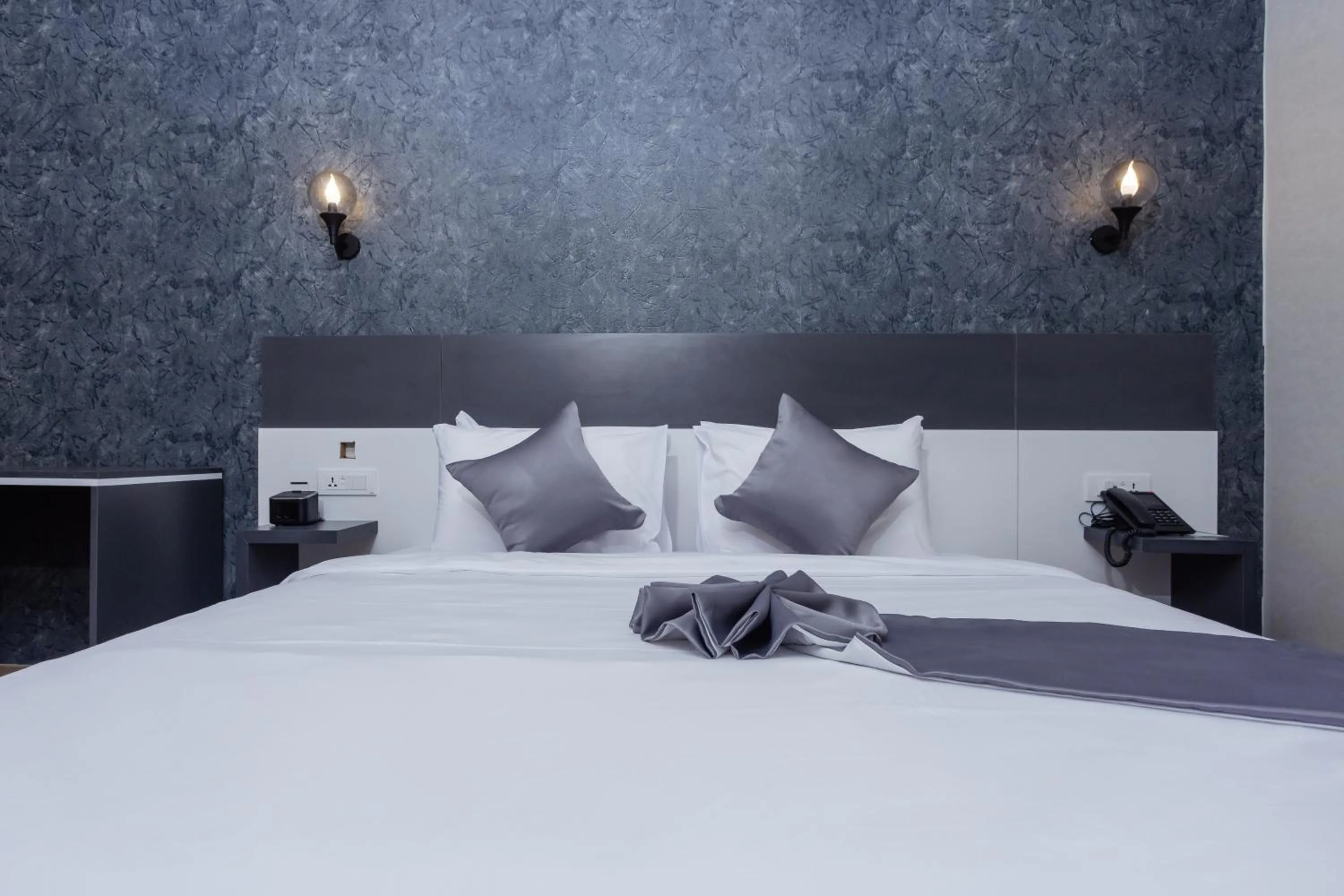 Bed in Shitaye Suite Hotel