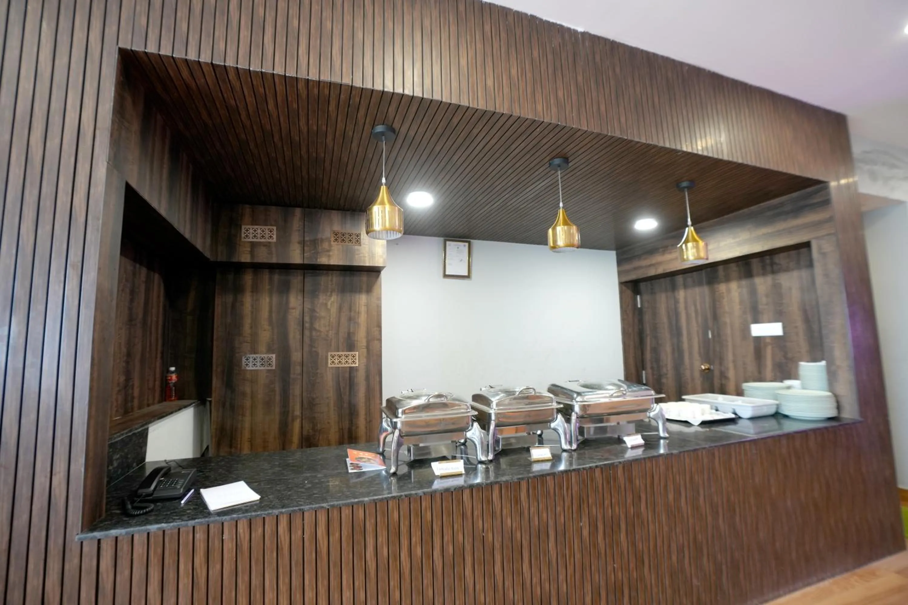 Kitchen or kitchenette in Hotel Viola Suites Madhapur, Business Hotel