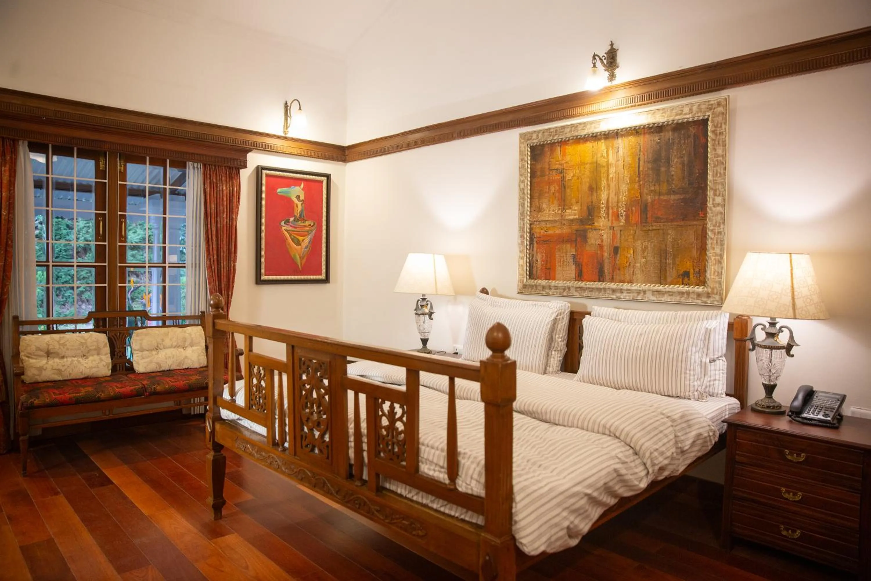 Bed in Marlihill Bungalow - A CGH Earth SAHA Experience