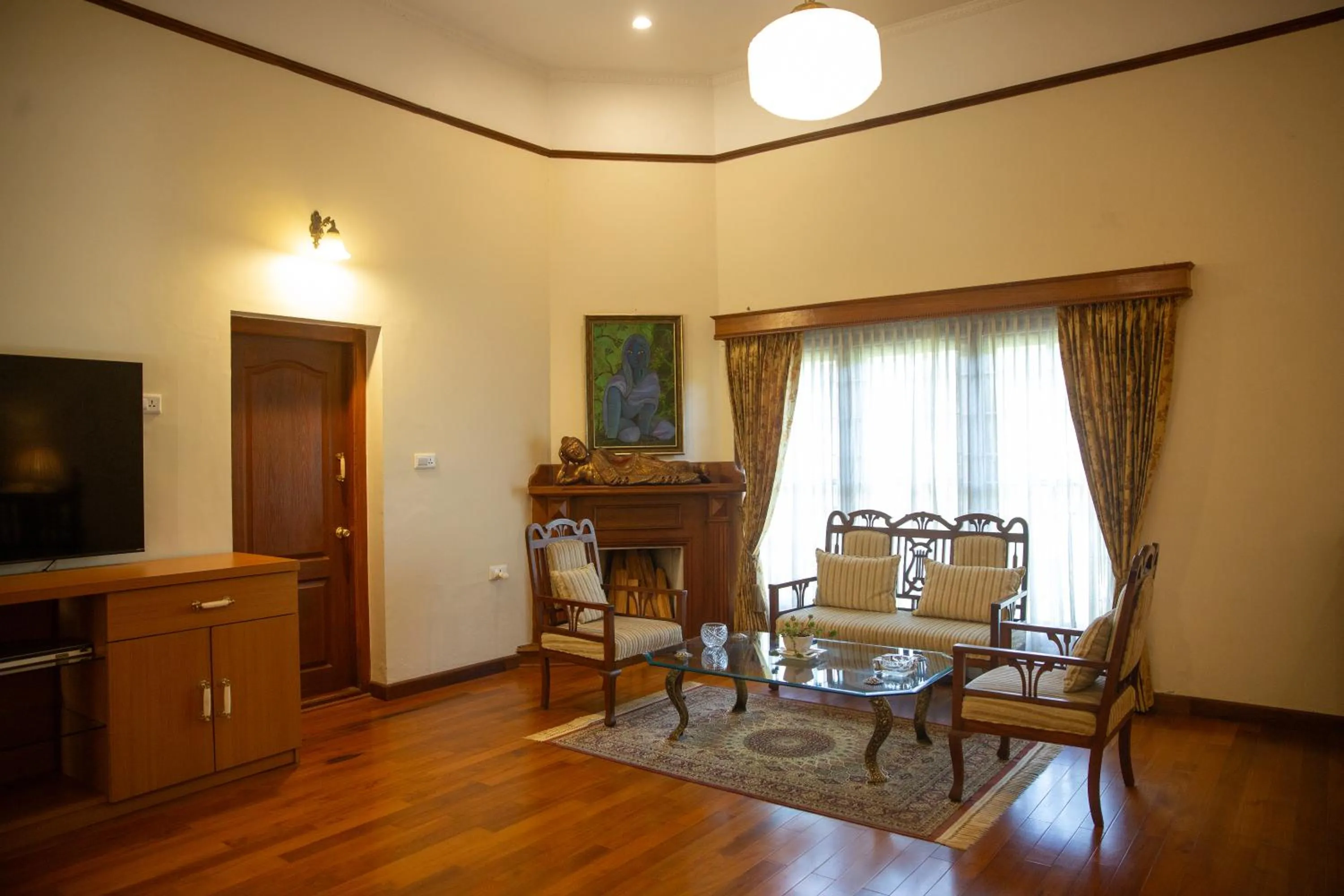 Seating area in Marlihill Bungalow - A CGH Earth SAHA Experience