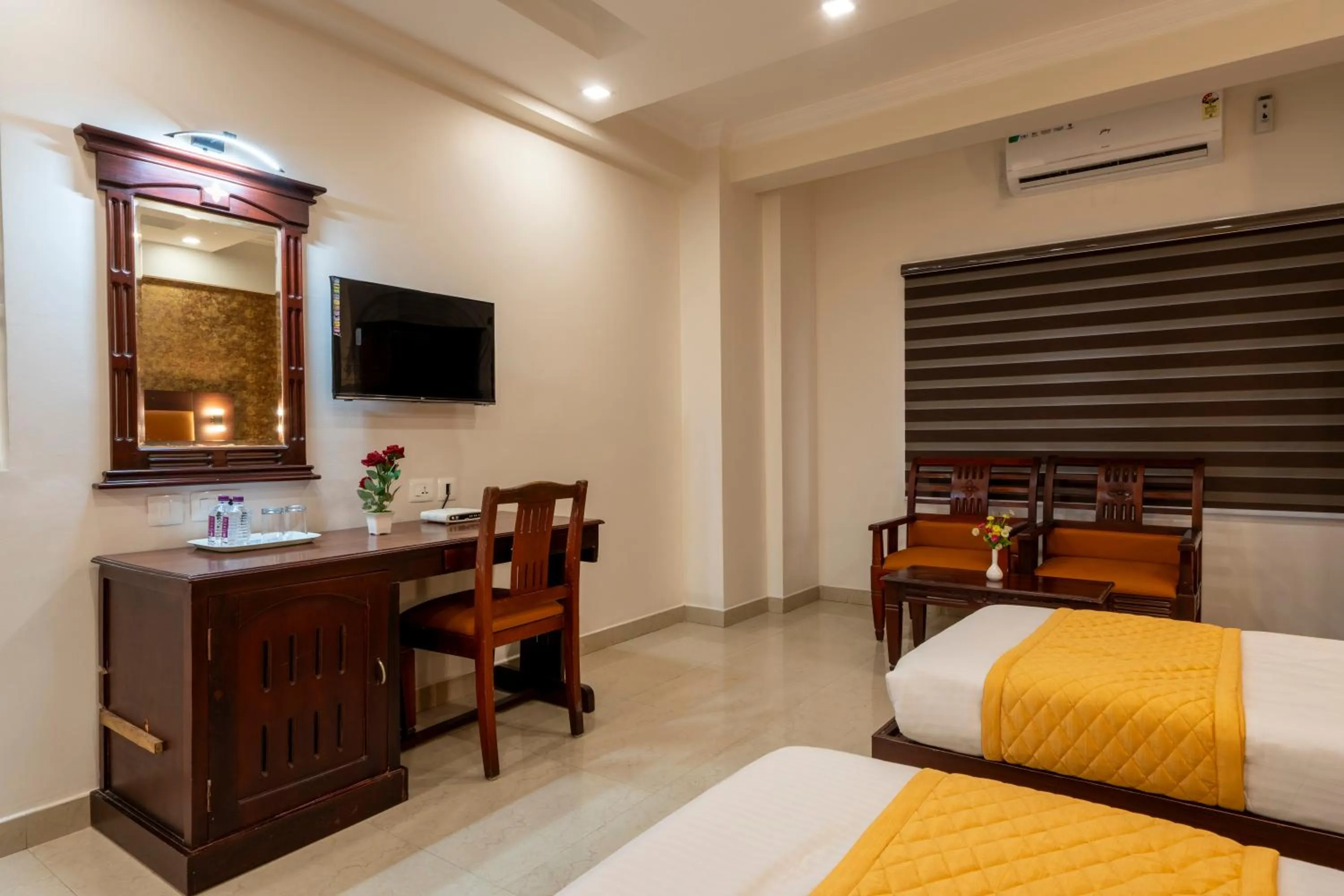 Seating area, Bed in Daan Orchid Residency