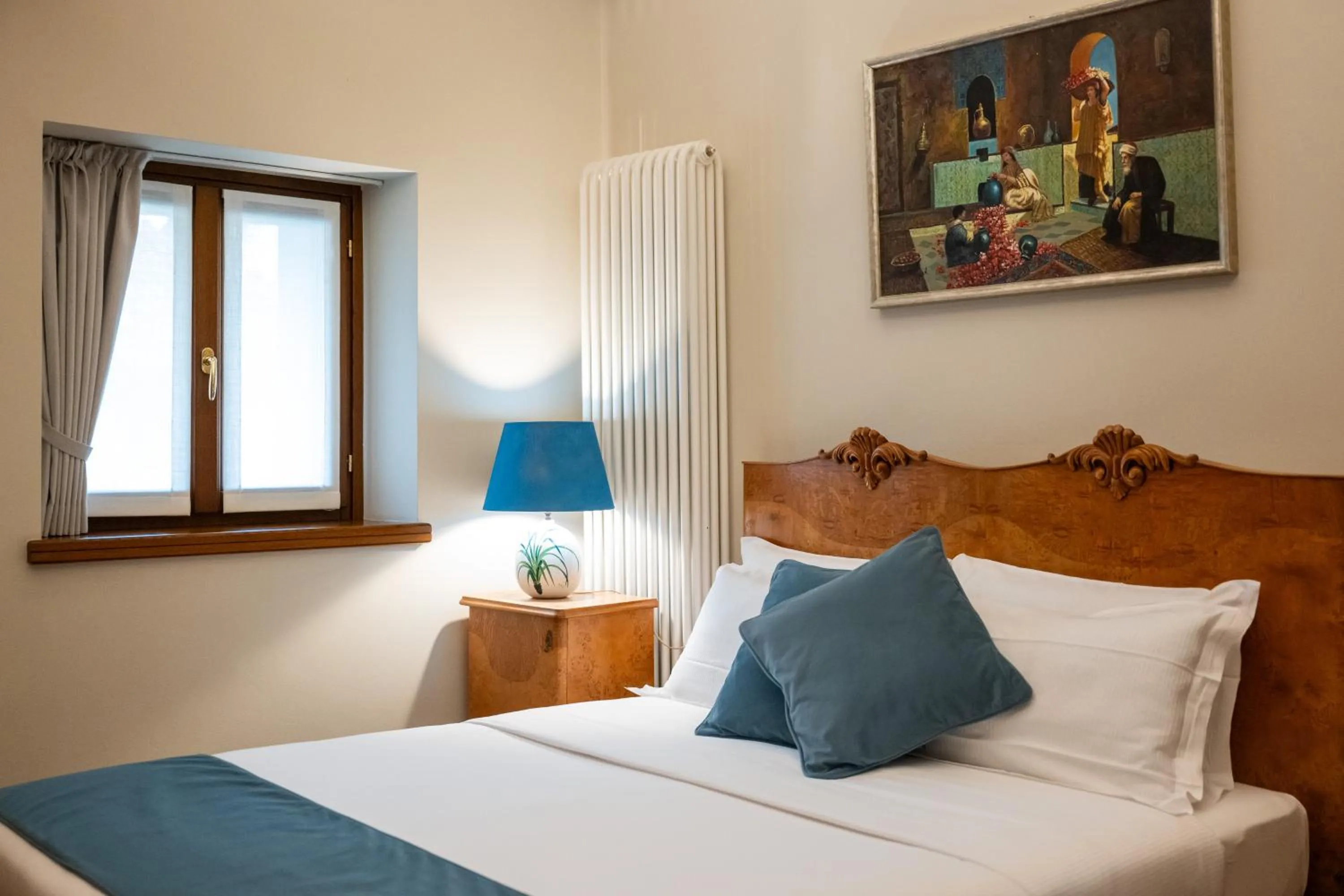 Bed in 1448 Antica Dimora Al Merlo Bianco