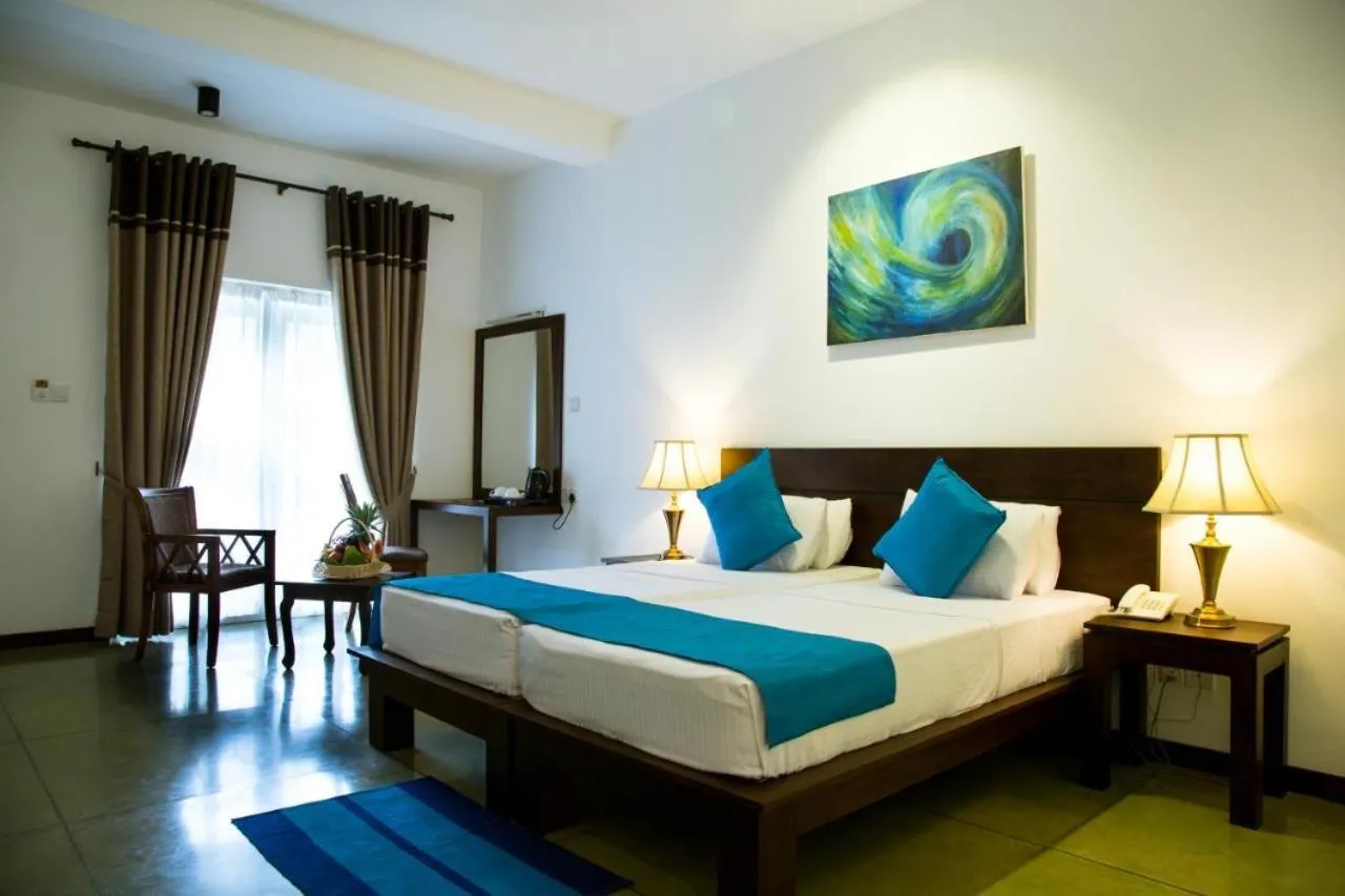 Photo of the whole room, Bed in Rathna Beach Wadduwa