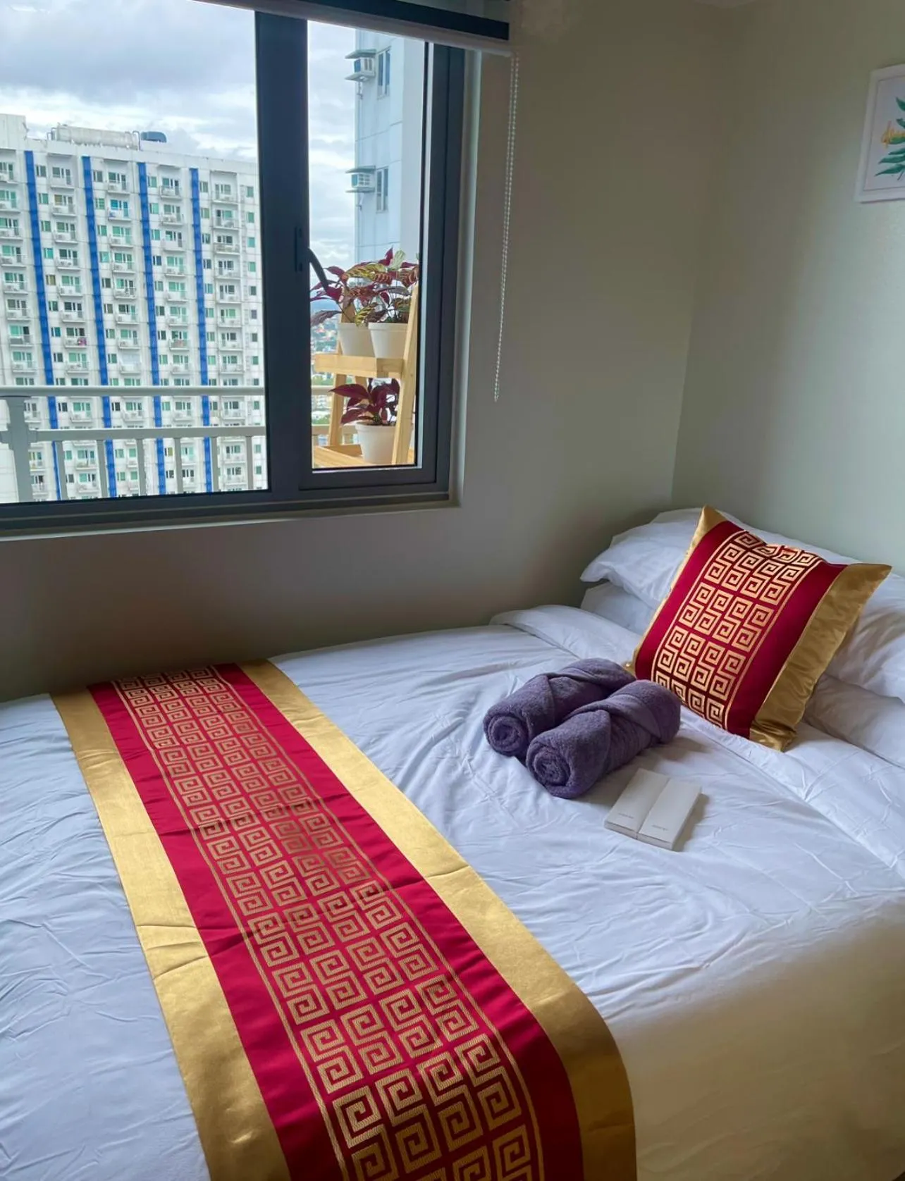 Bed in Grass Residences Aesthetic Staycation