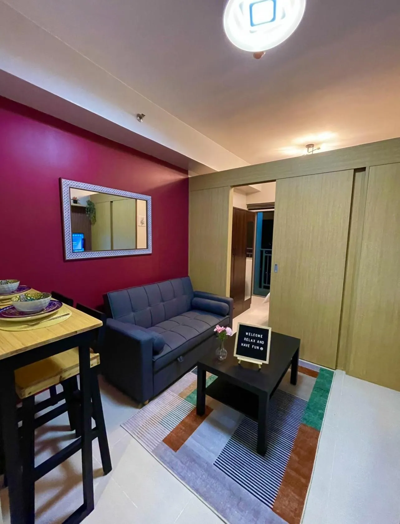 Living room, Bed in Grass Residences Aesthetic Staycation