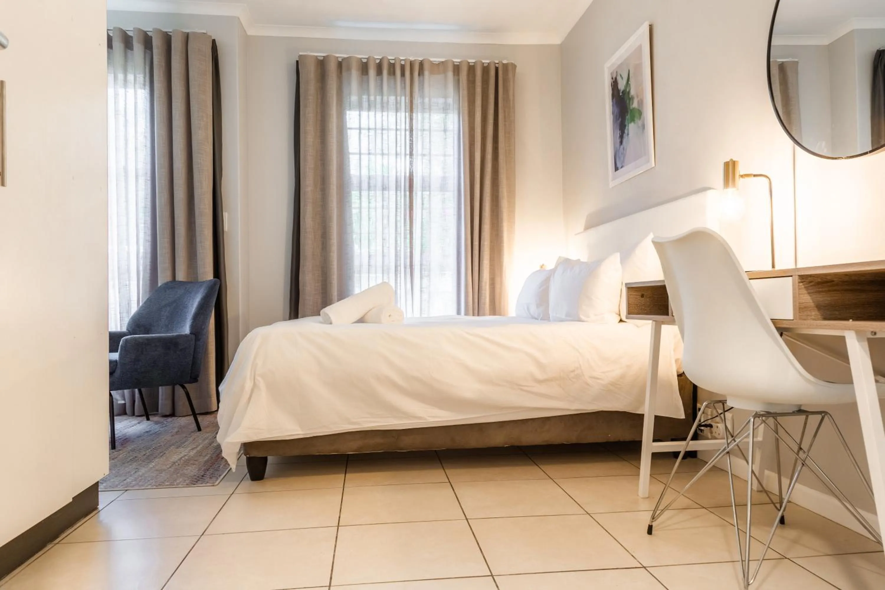 Bed in WINK Aparthotel Quiver Tree