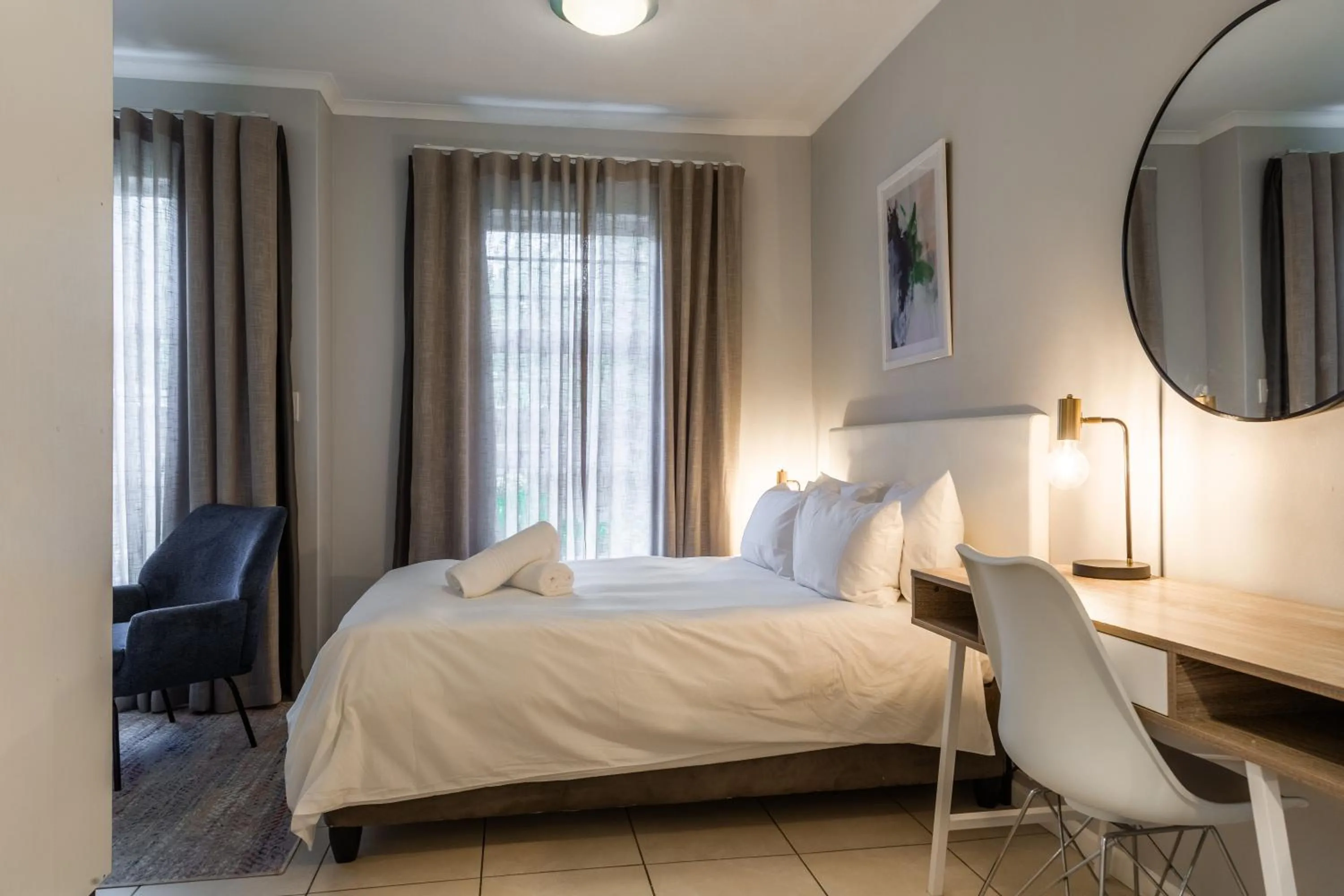 Bed in WINK Aparthotel Quiver Tree