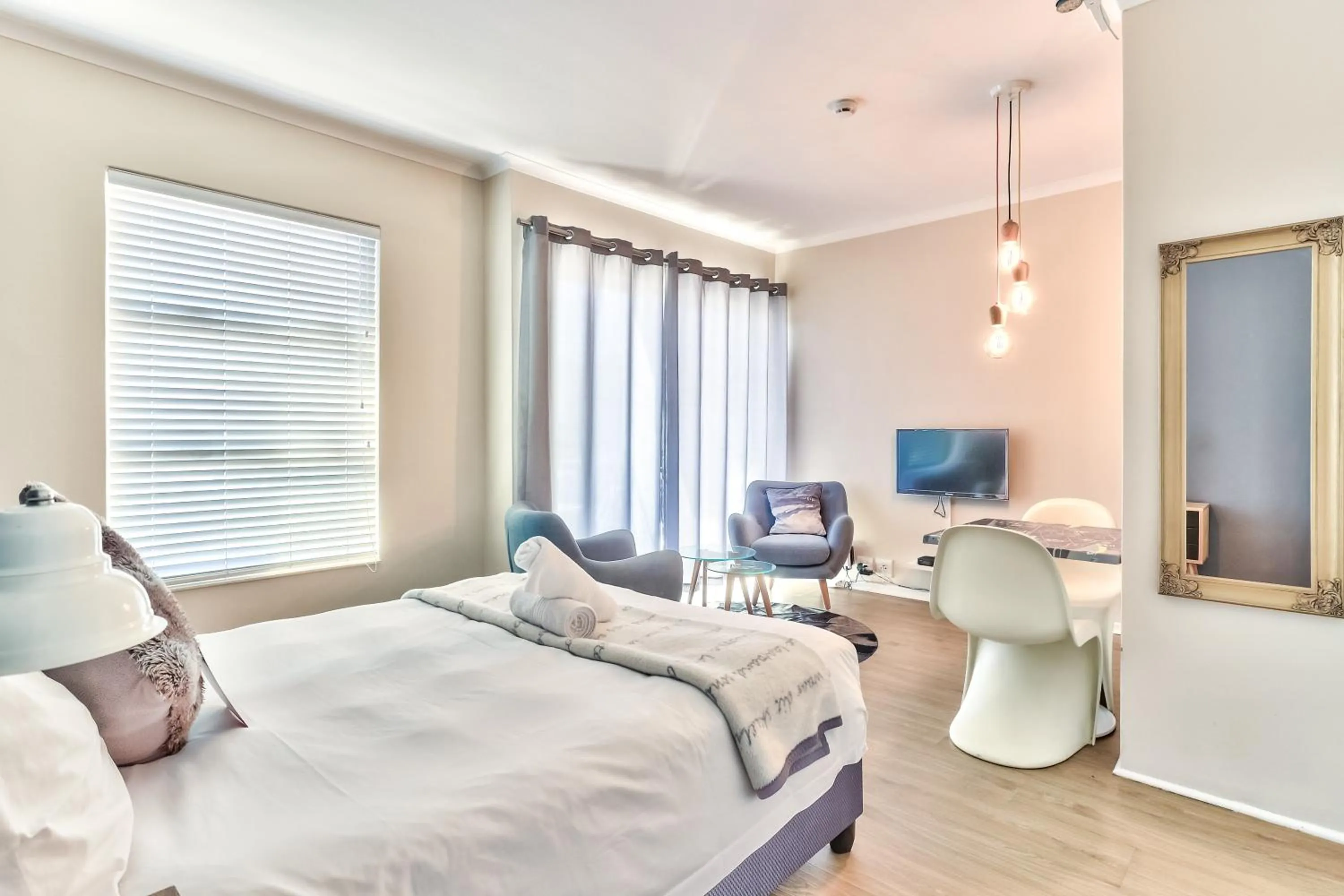 Bed in WINK Aparthotel Quiver Tree