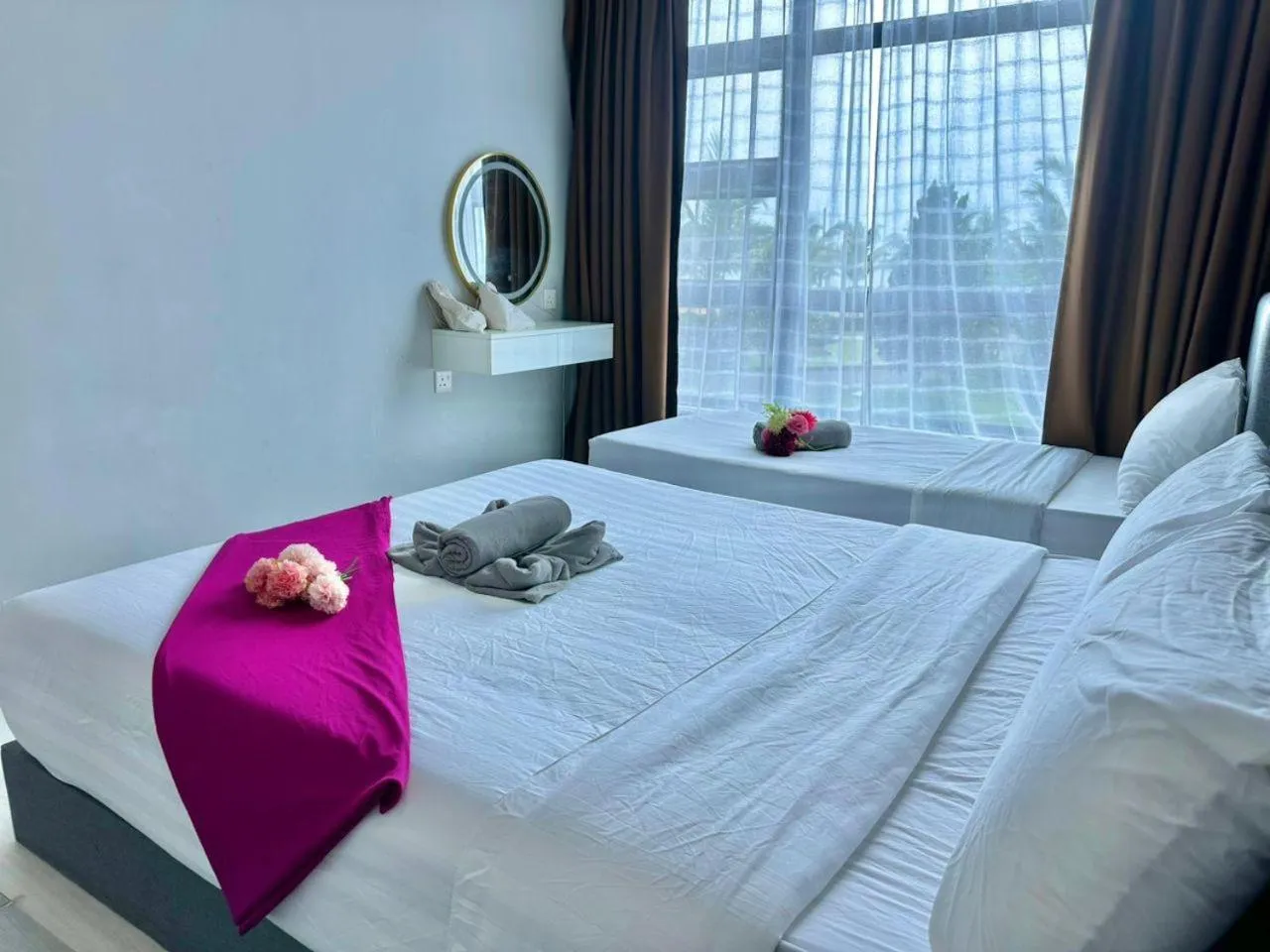 Bed in Jesselton Quay Kota Kinabalu City Centre by LW Suites