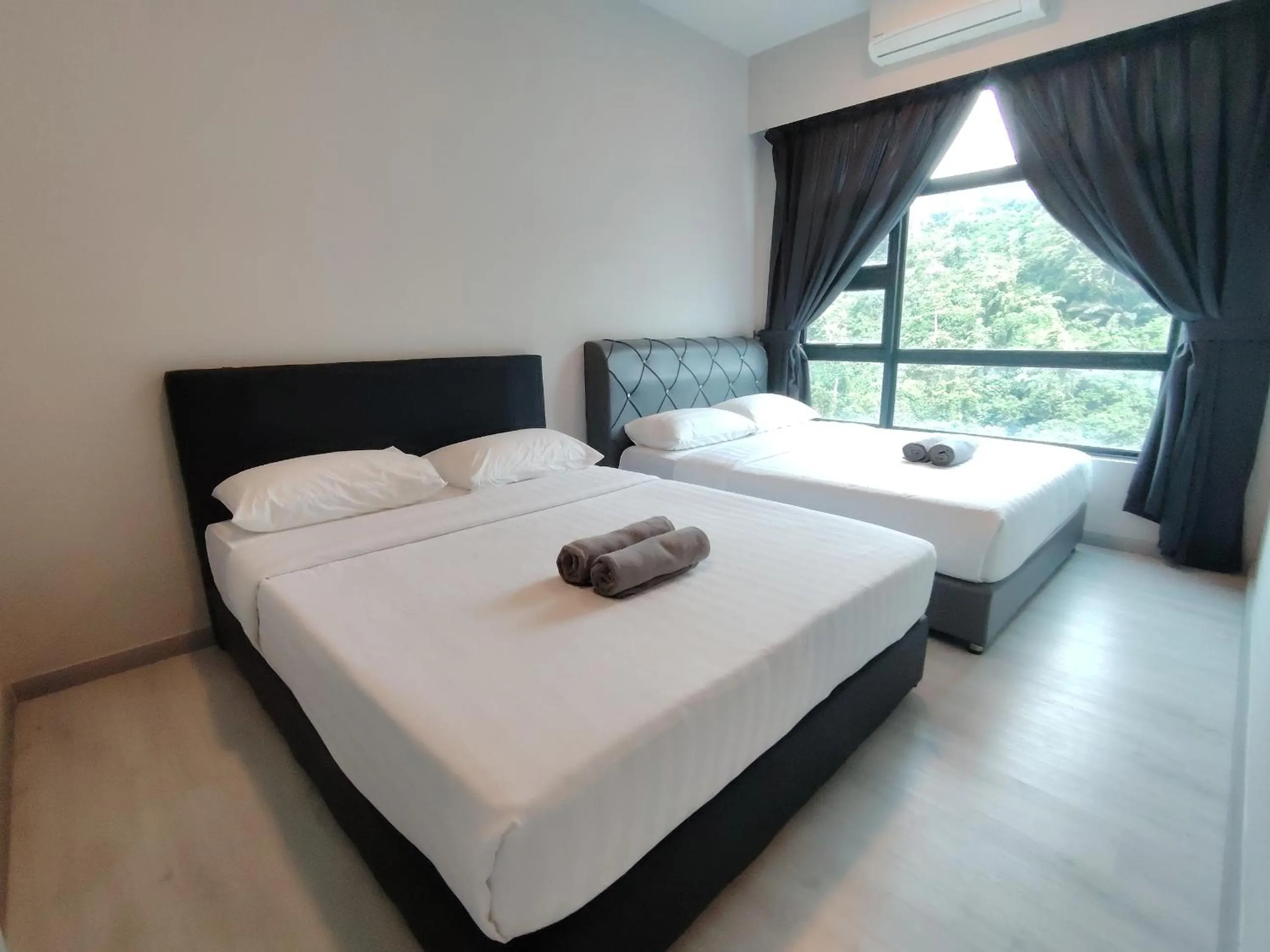 Bed in Jesselton Quay Kota Kinabalu City Centre by LW Suites