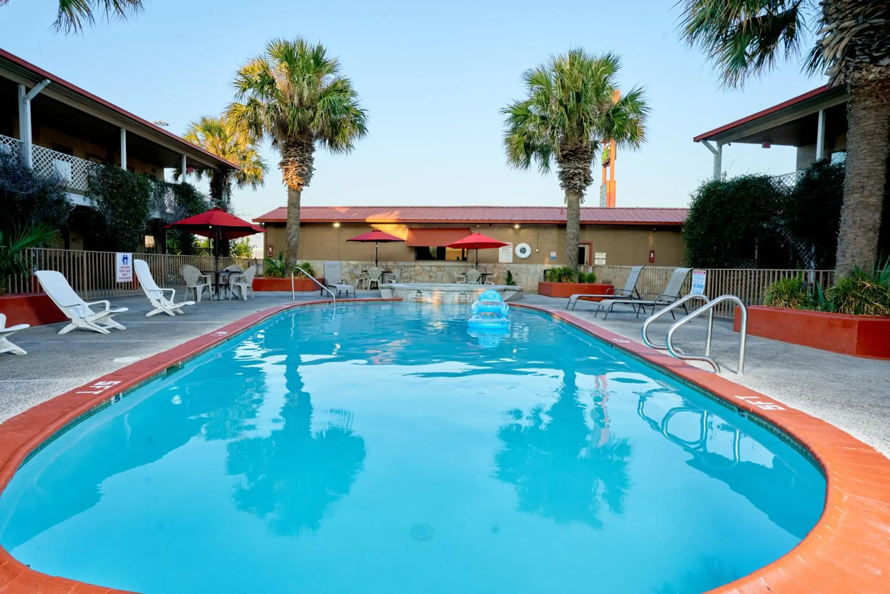 Swimming pool in Family Garden Inn & Suites Swimming pool in Family Garden Inn & Suites