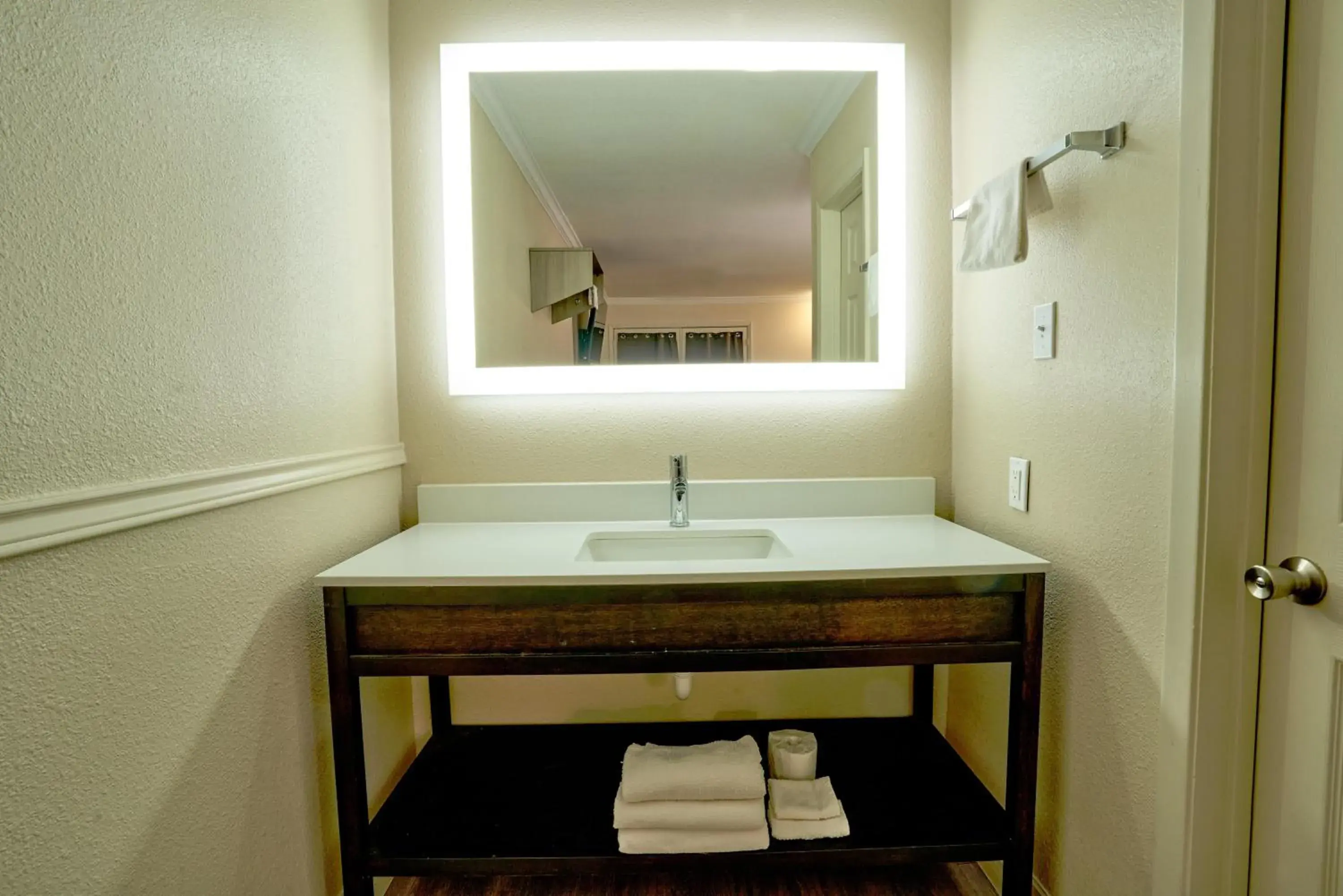 Bathroom in Family Garden Inn & Suites Bathroom in Family Garden Inn & Suites