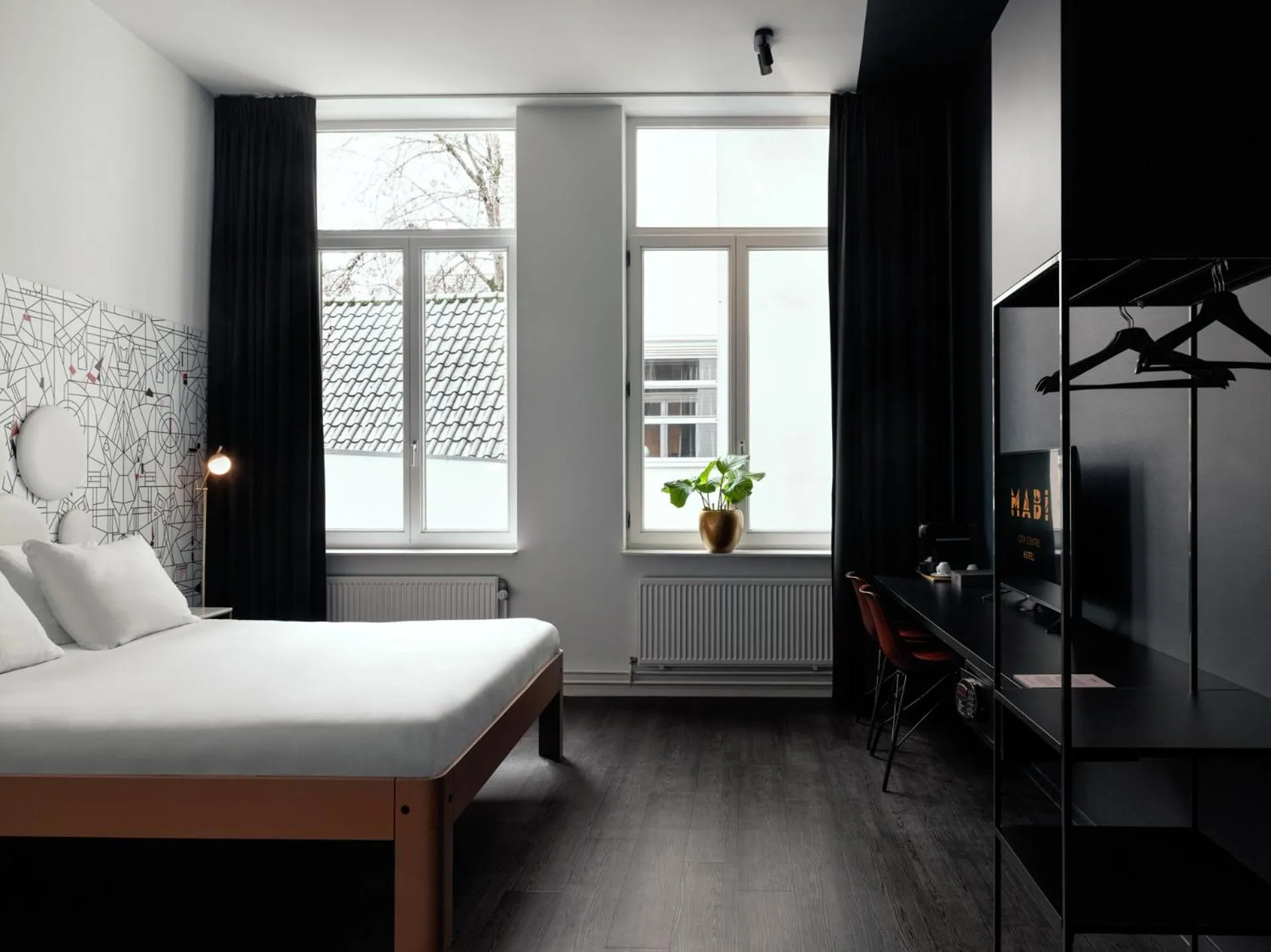 Photo of the whole room, Bed in MABI City Centre