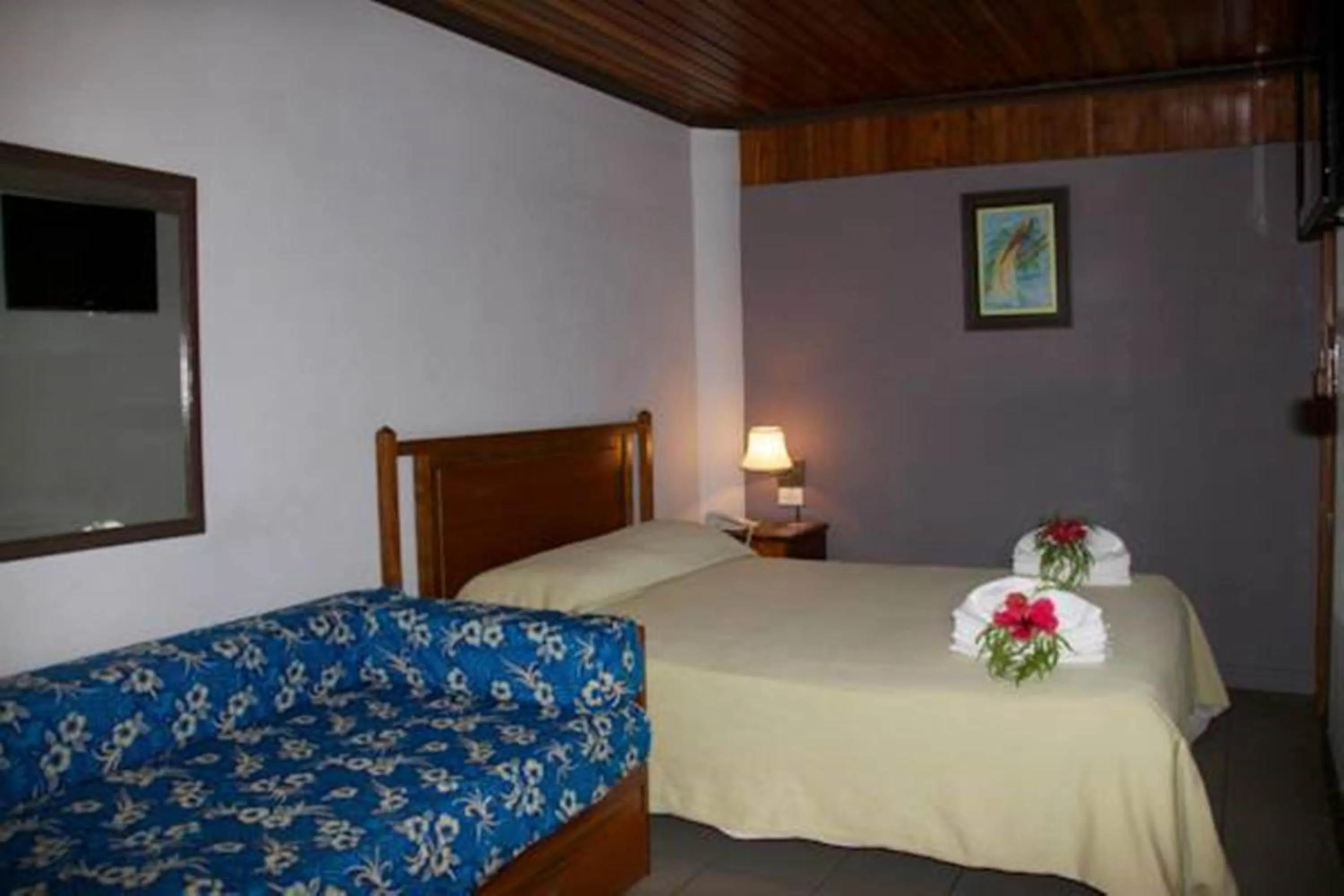 Bed in Hideaway Hotel