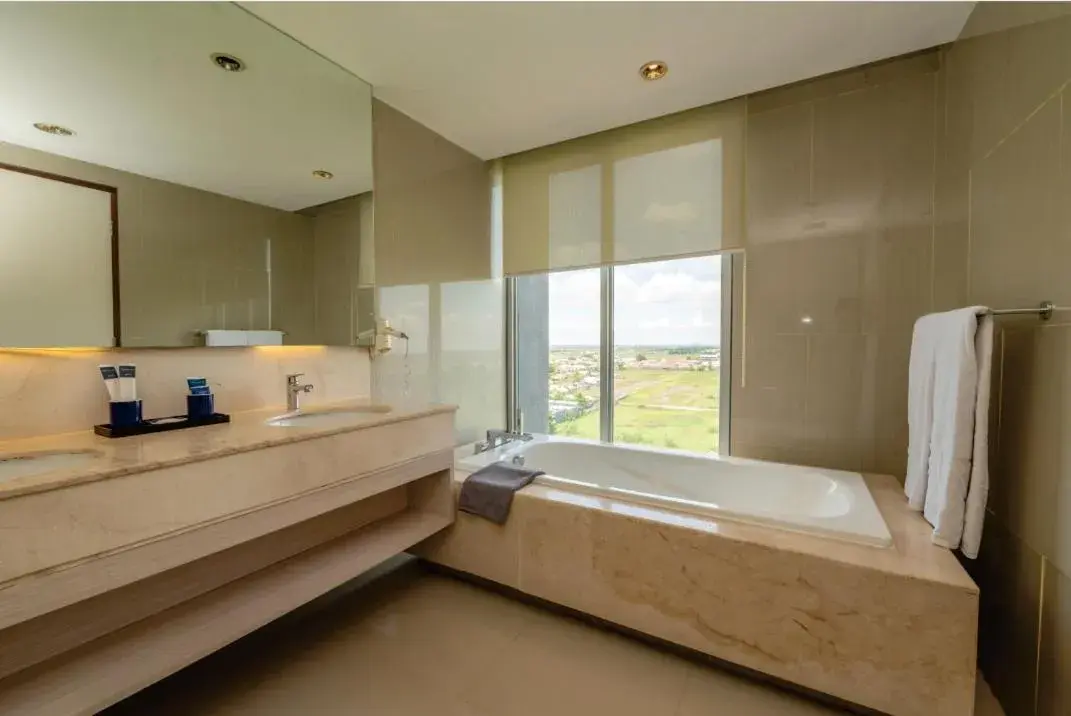 Bath, Bed in Grand Tan Banjarmasin Hotel & Convention Center Bath, Bed in Grand Tan Banjarmasin Hotel & Convention Center