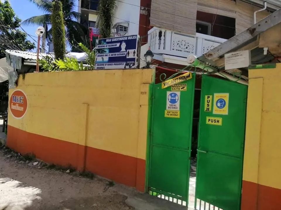 Property logo or sign in M&E Guesthouse