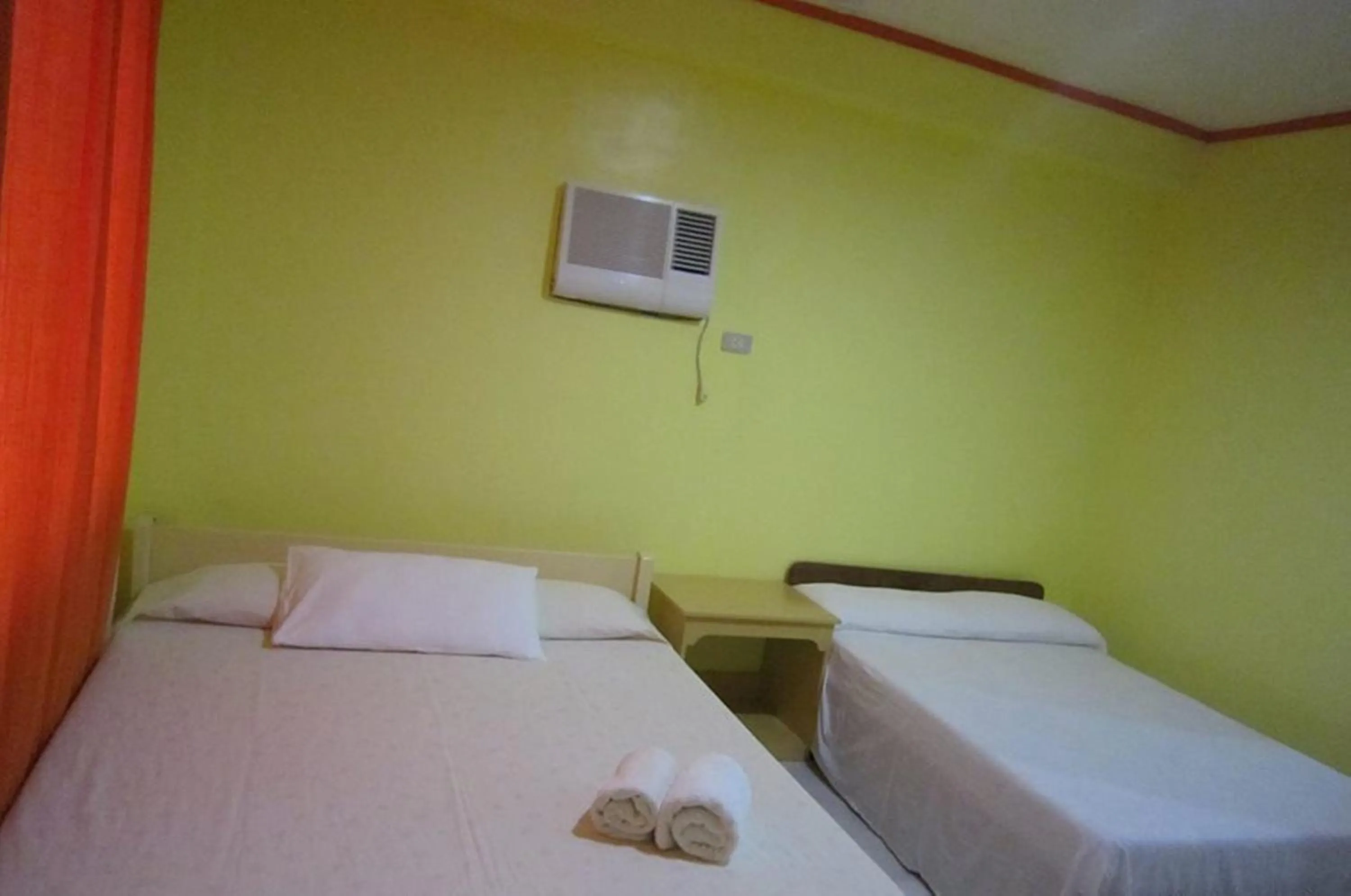 Bed in M&E Guesthouse