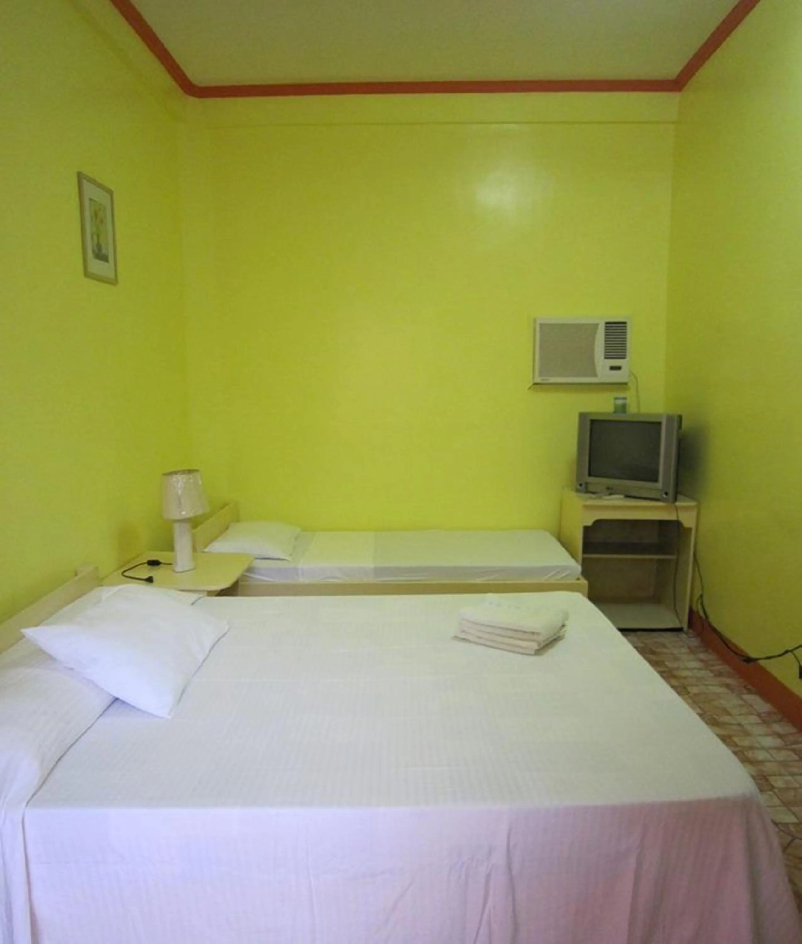 Bed in M&E Guesthouse