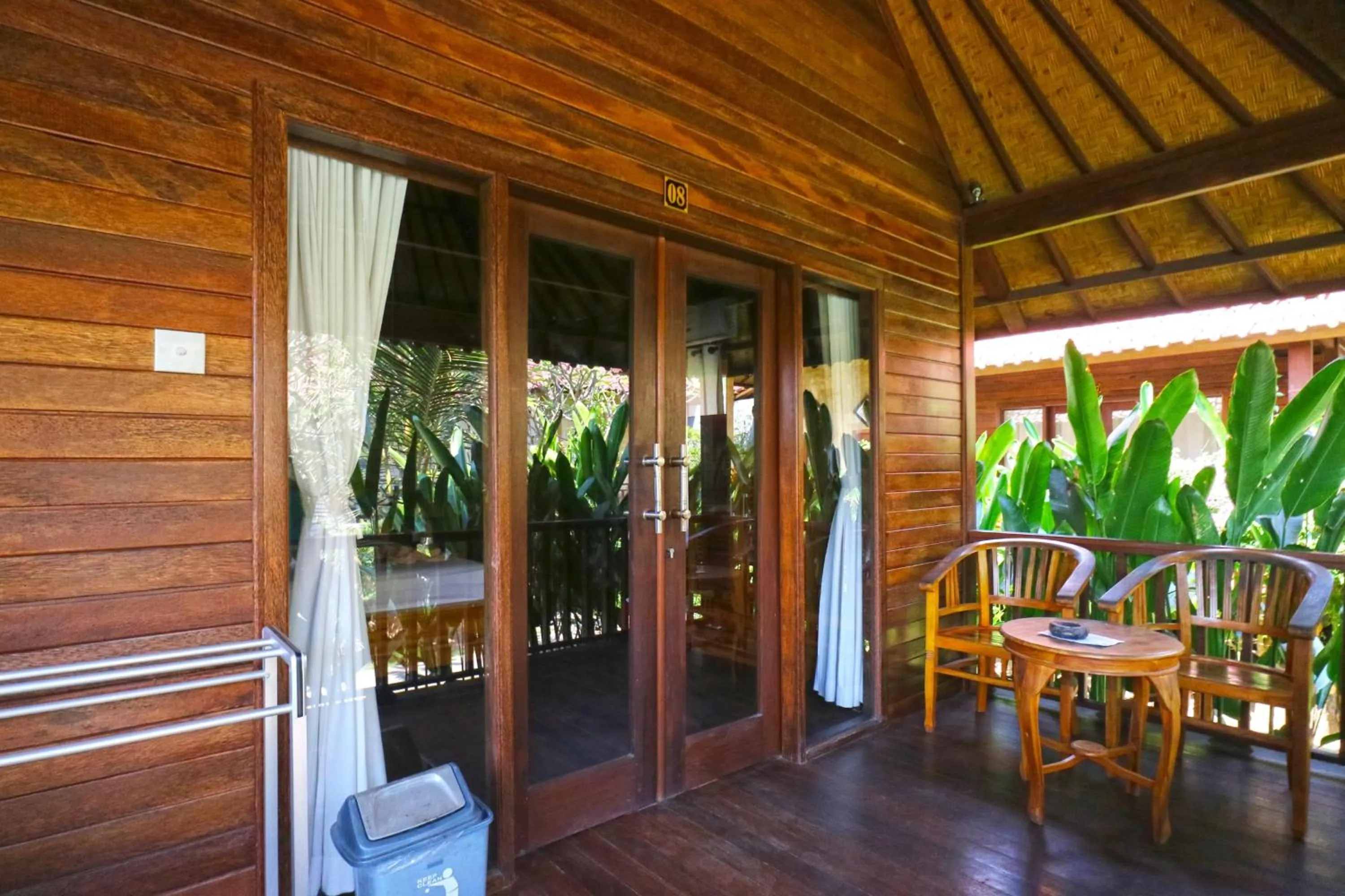 Property building in Nyoman Guesthouse and Grill