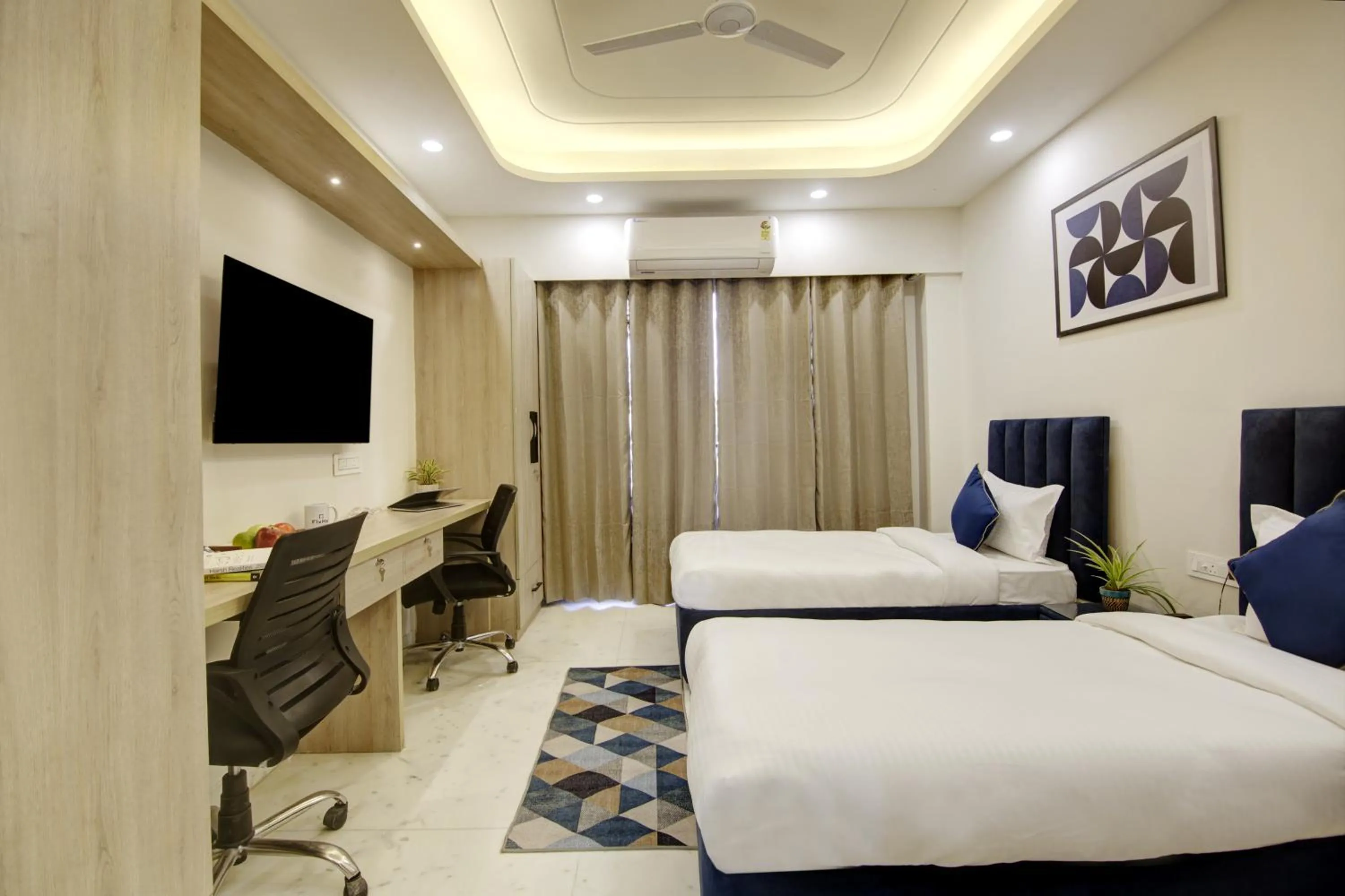 TV and multimedia in FlxHo Quad - Luxury Studio Apart Hotel DLF Cyber City