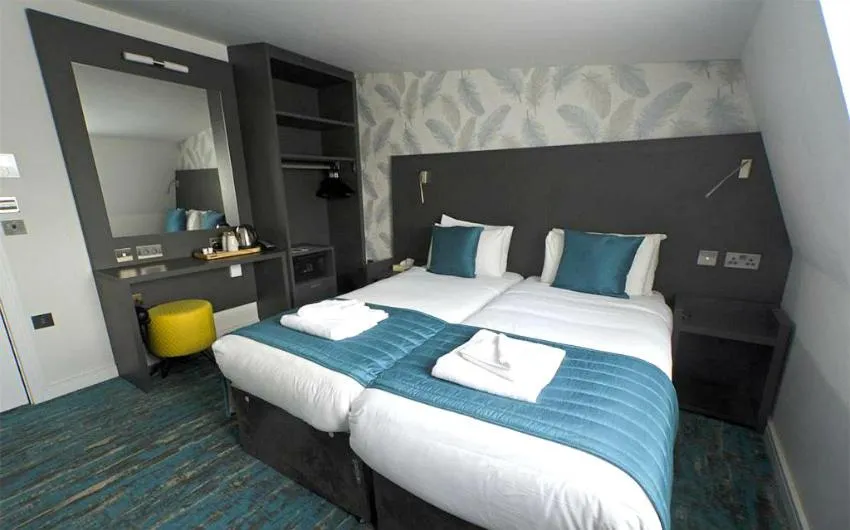 Photo of the whole room, Bed in K Hotel Kensington
