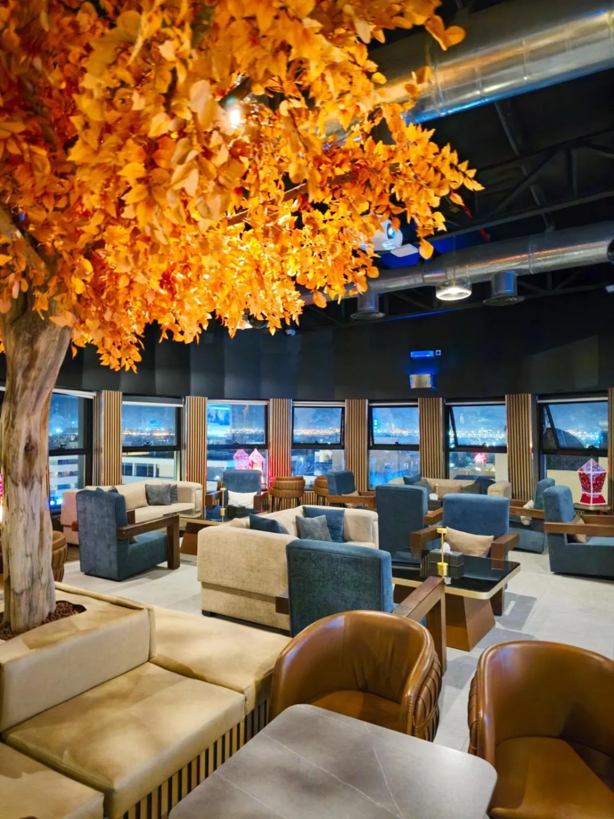 Communal lounge/ TV room in Aluya Hotel