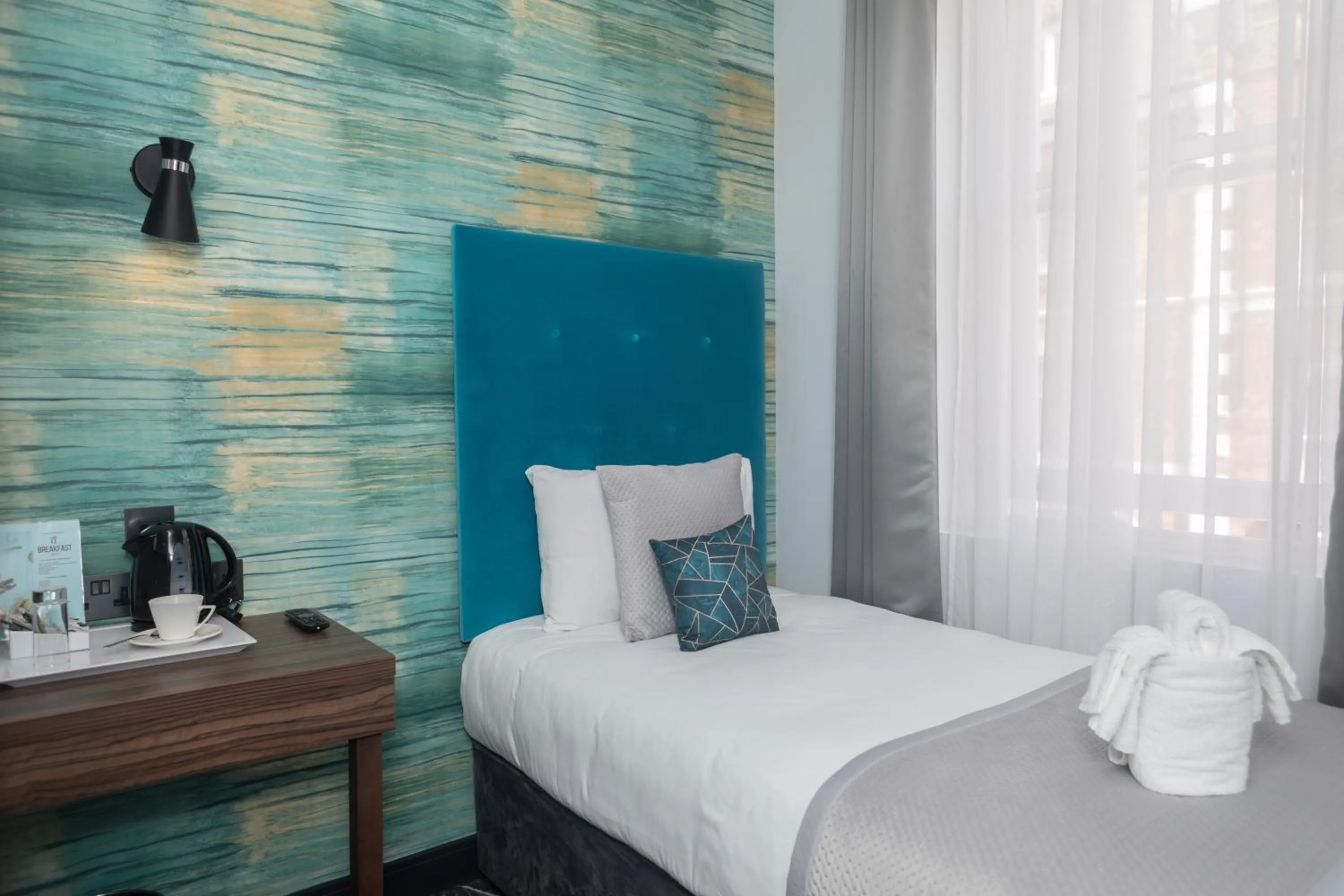 Bed in Paddington Park Hotel