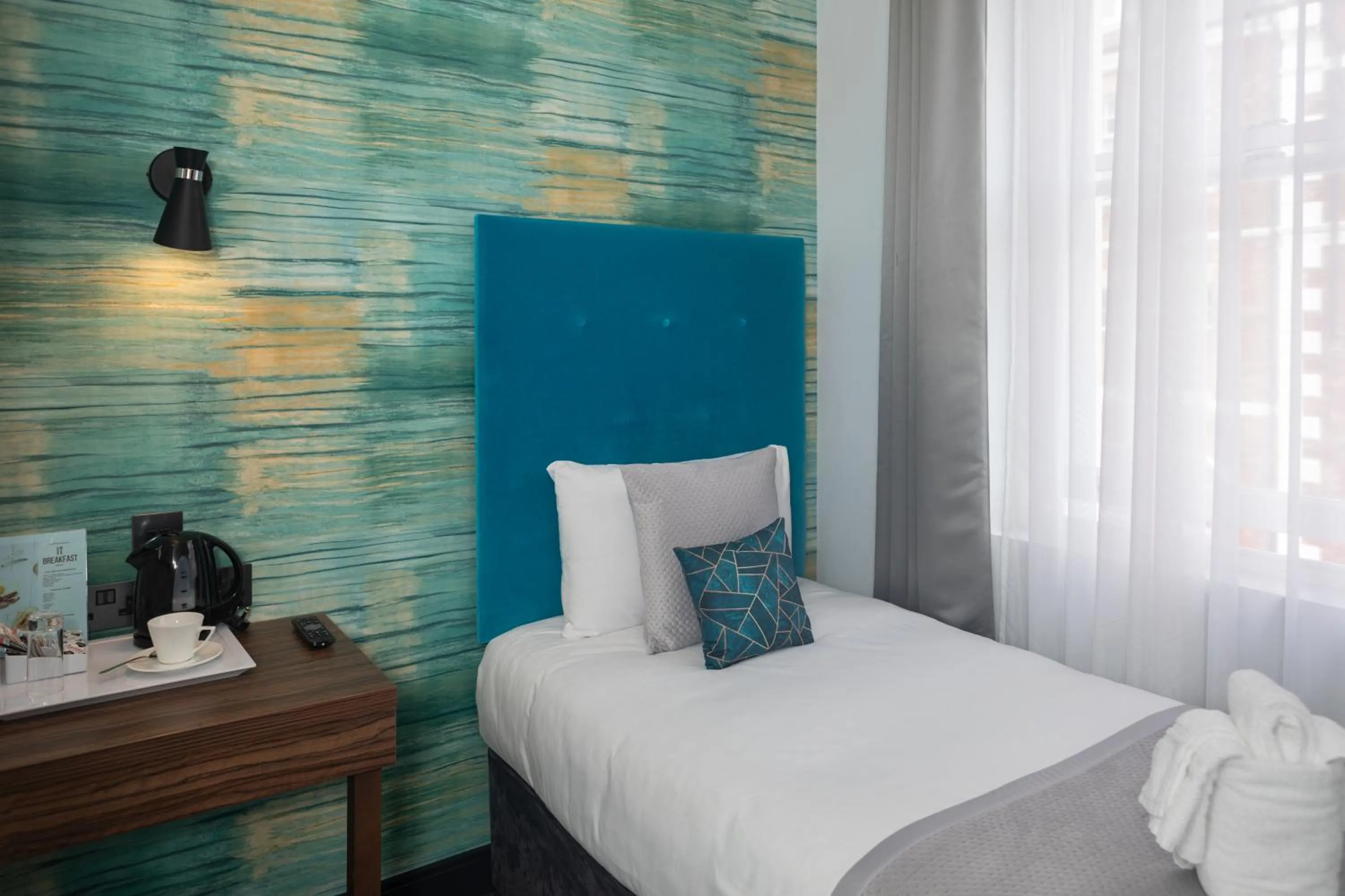 Bed in Paddington Park Hotel