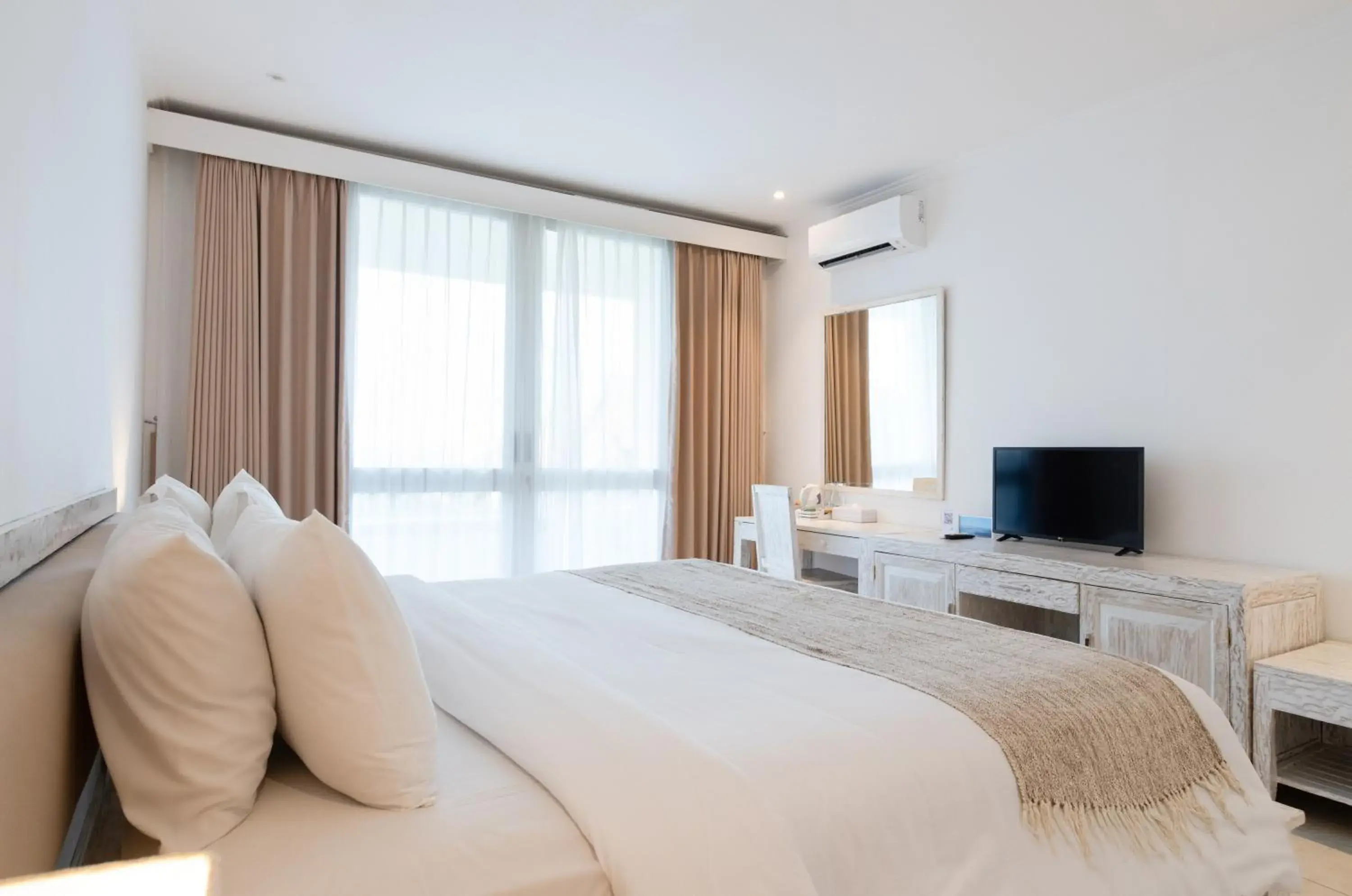 Bed in Blue Point Resort and Spa Bed in Blue Point Resort and Spa