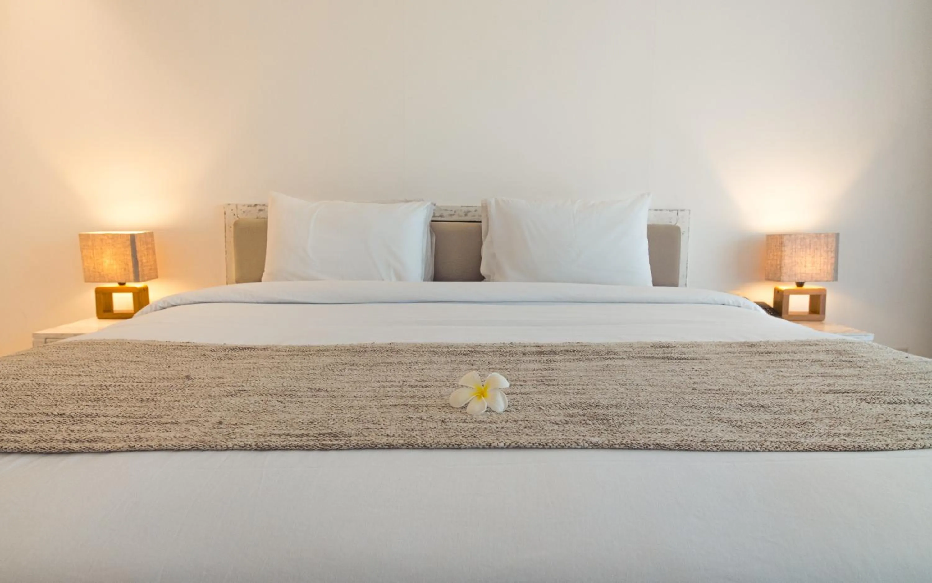 Bed in Blue Point Resort and Spa