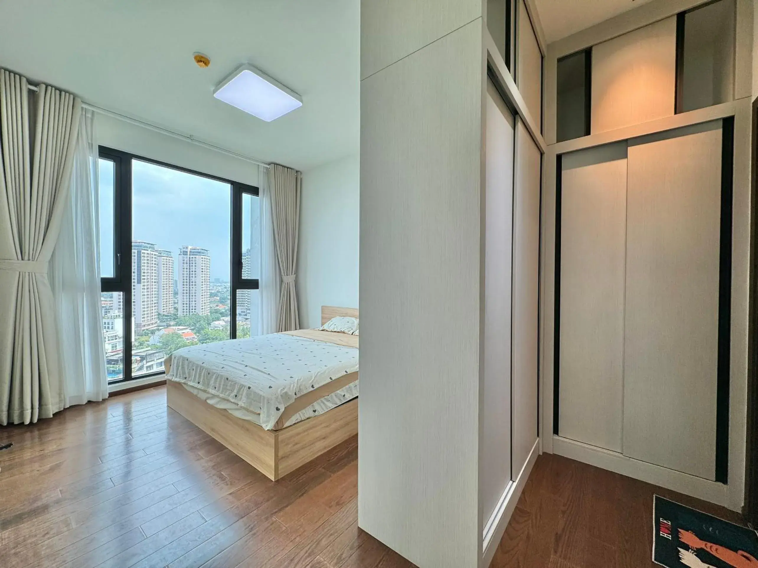 Bed in Homie's Dedge Thao Dien Luxury Apartment Bed in Homie's Dedge Thao Dien Luxury Apartment