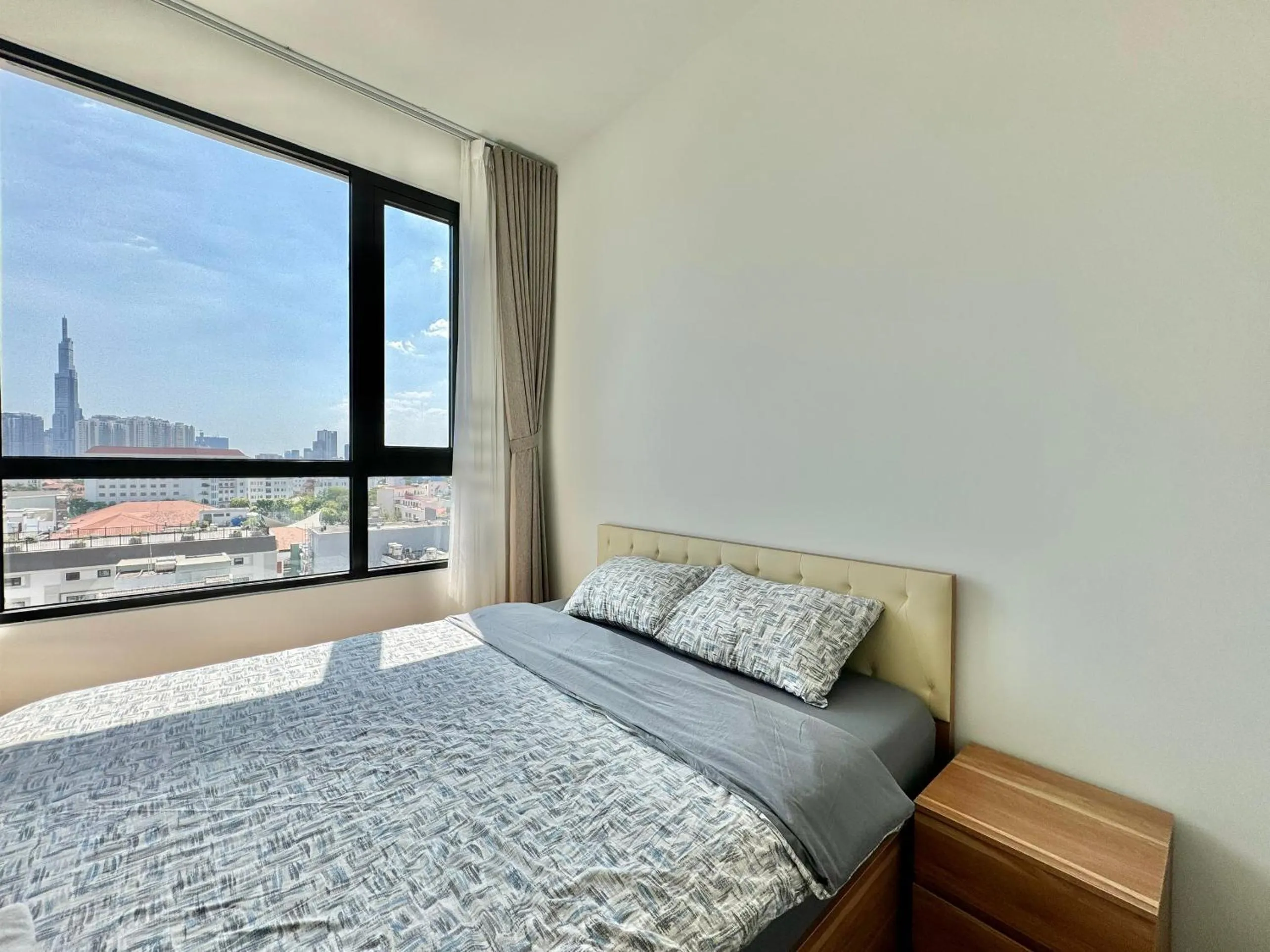 Bed in Homie's Dedge Thao Dien Luxury Apartment