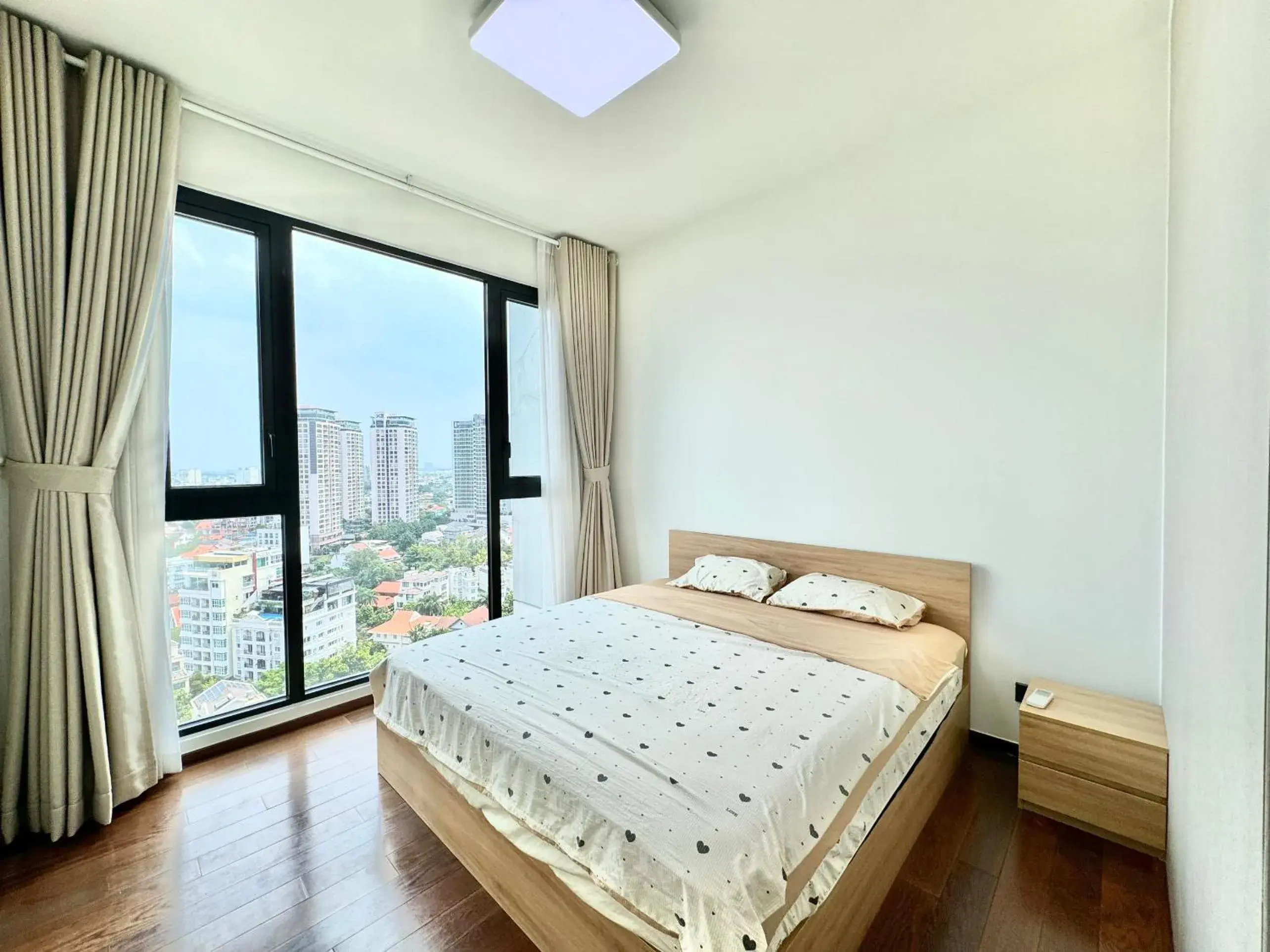 Bed in Homie's Dedge Thao Dien Luxury Apartment Bed in Homie's Dedge Thao Dien Luxury Apartment
