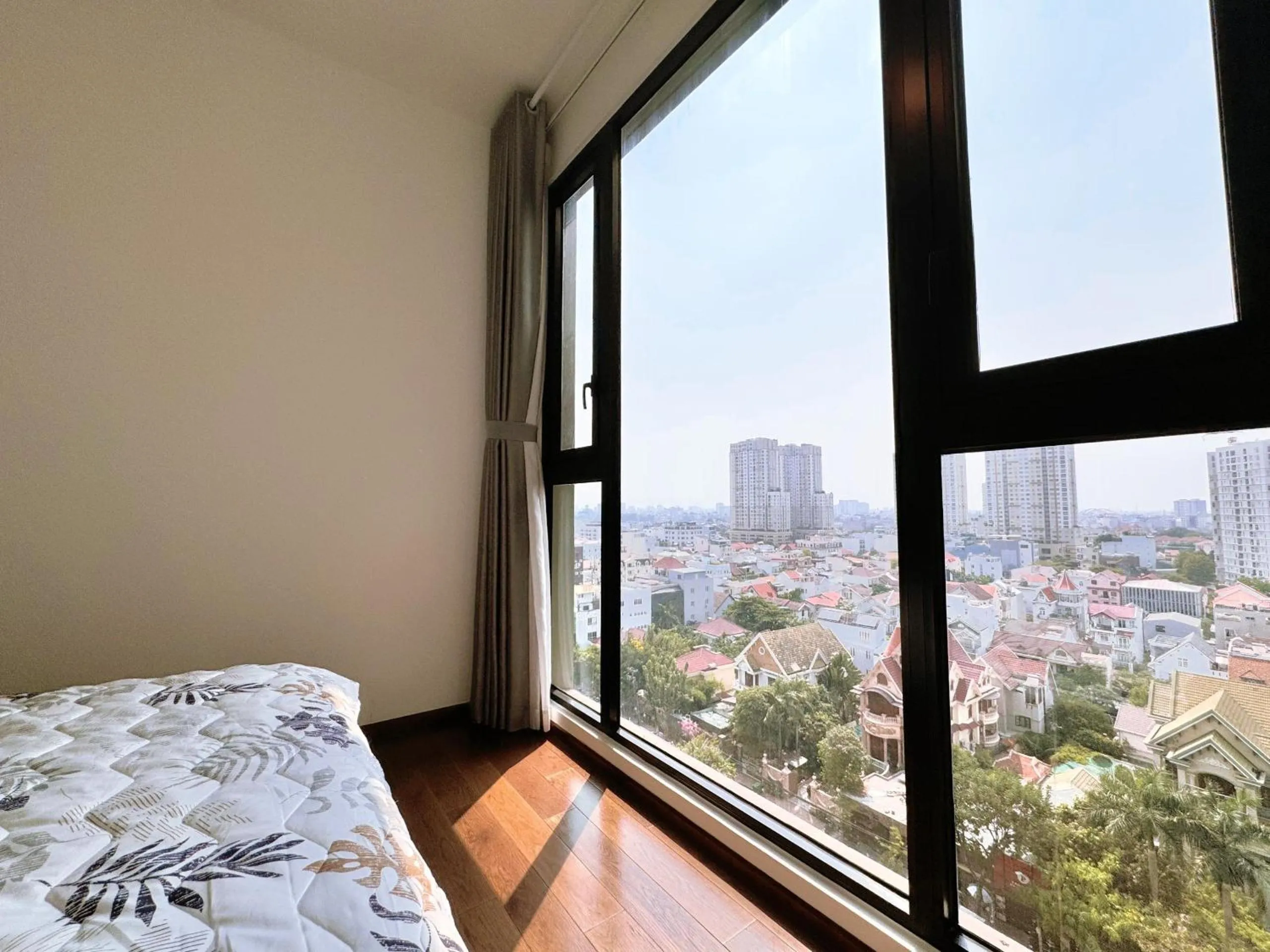 Bed in Homie's Dedge Thao Dien Luxury Apartment