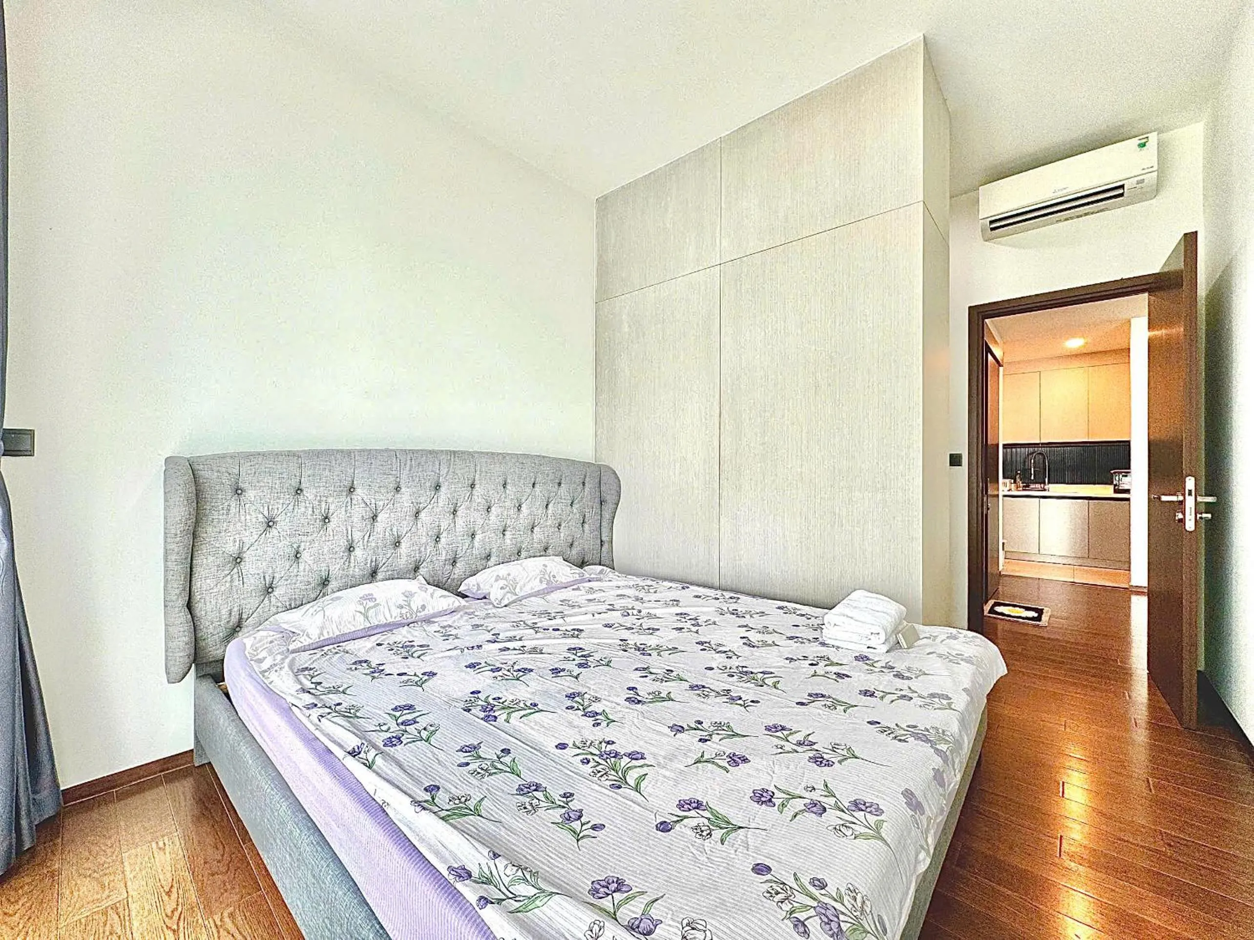 Bed in Homie's Dedge Thao Dien Luxury Apartment